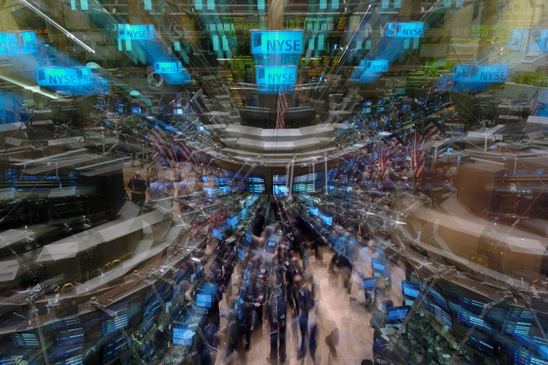 Traders work the floor of the New York Stock Exchange in March 2005.