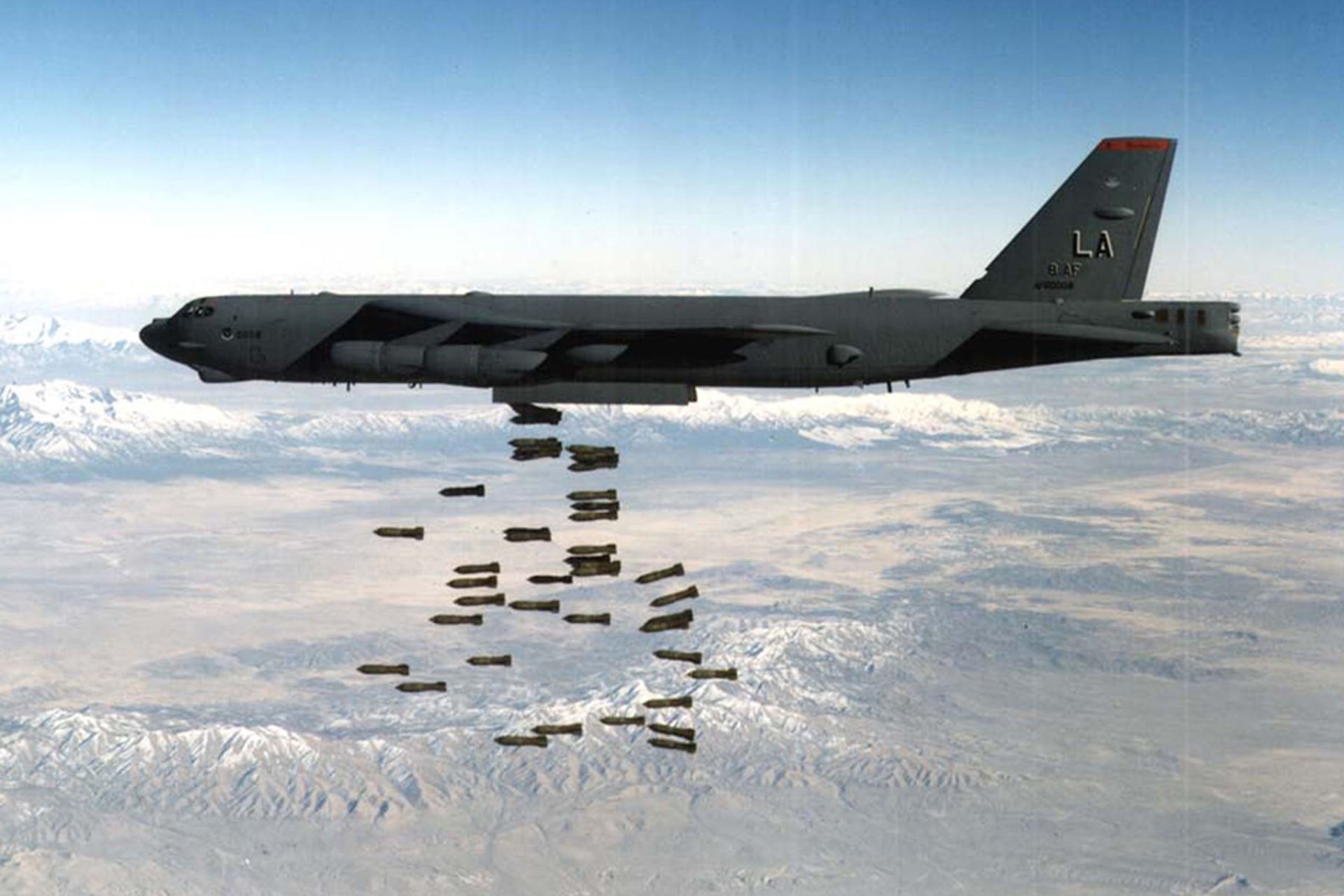 A B-52 drops a load of bombs in Afghanistan. Master