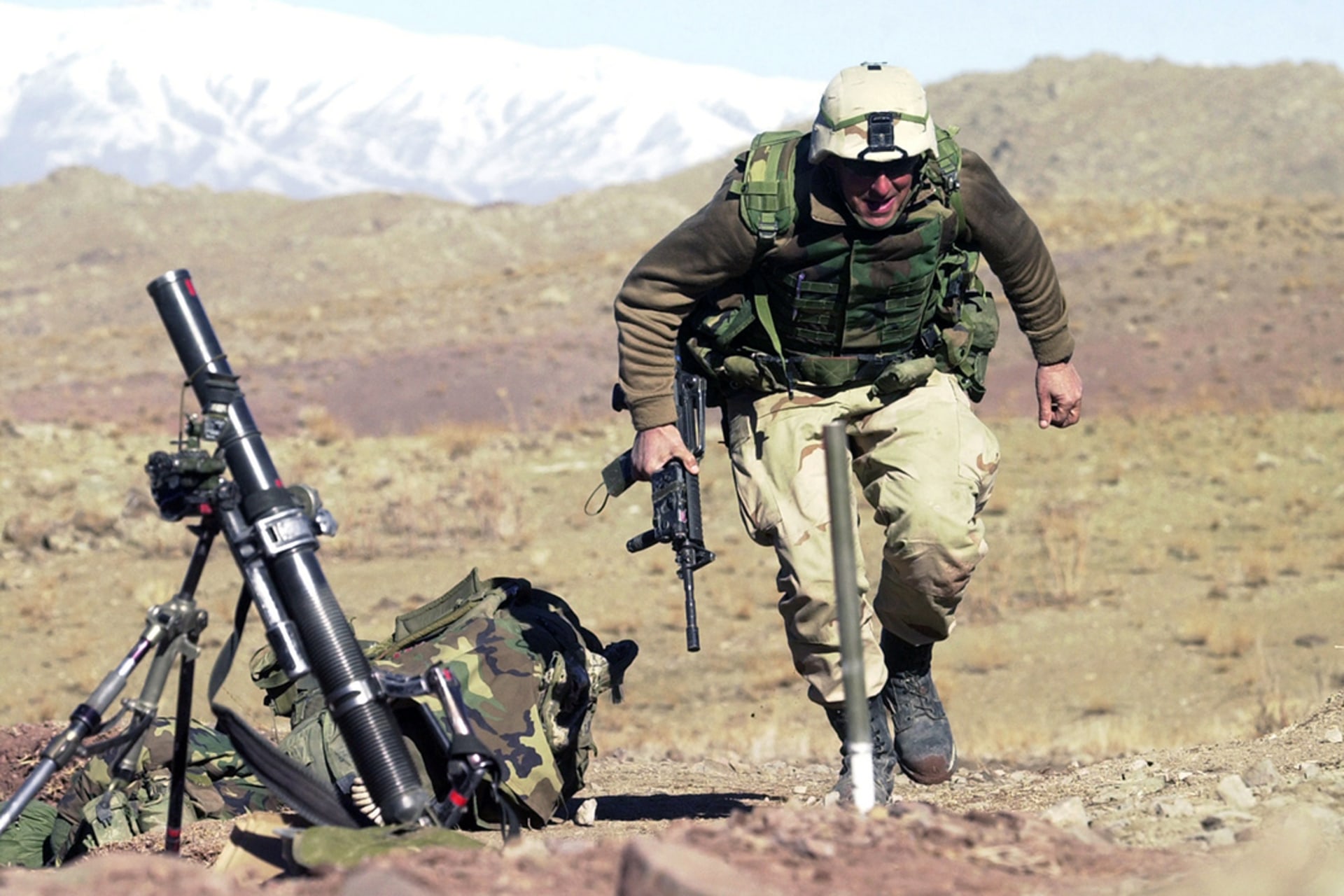 A U.S. soldier during a firefight near Sirkankel, Afghanistan, March 2002. 
