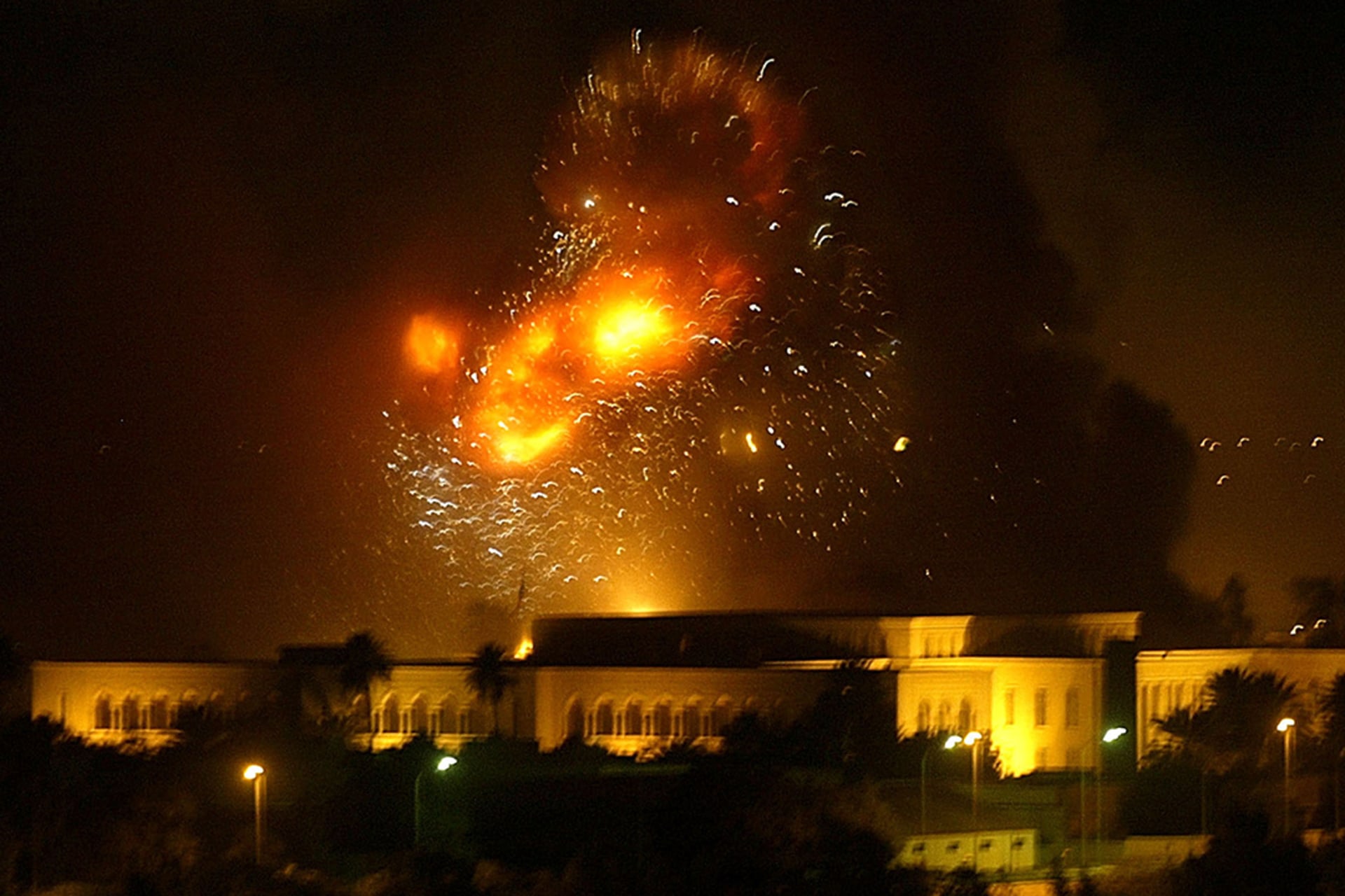 An explosion rocks one of the palaces of Iraqi President Saddam Hussein in Baghdad during air strikes. 