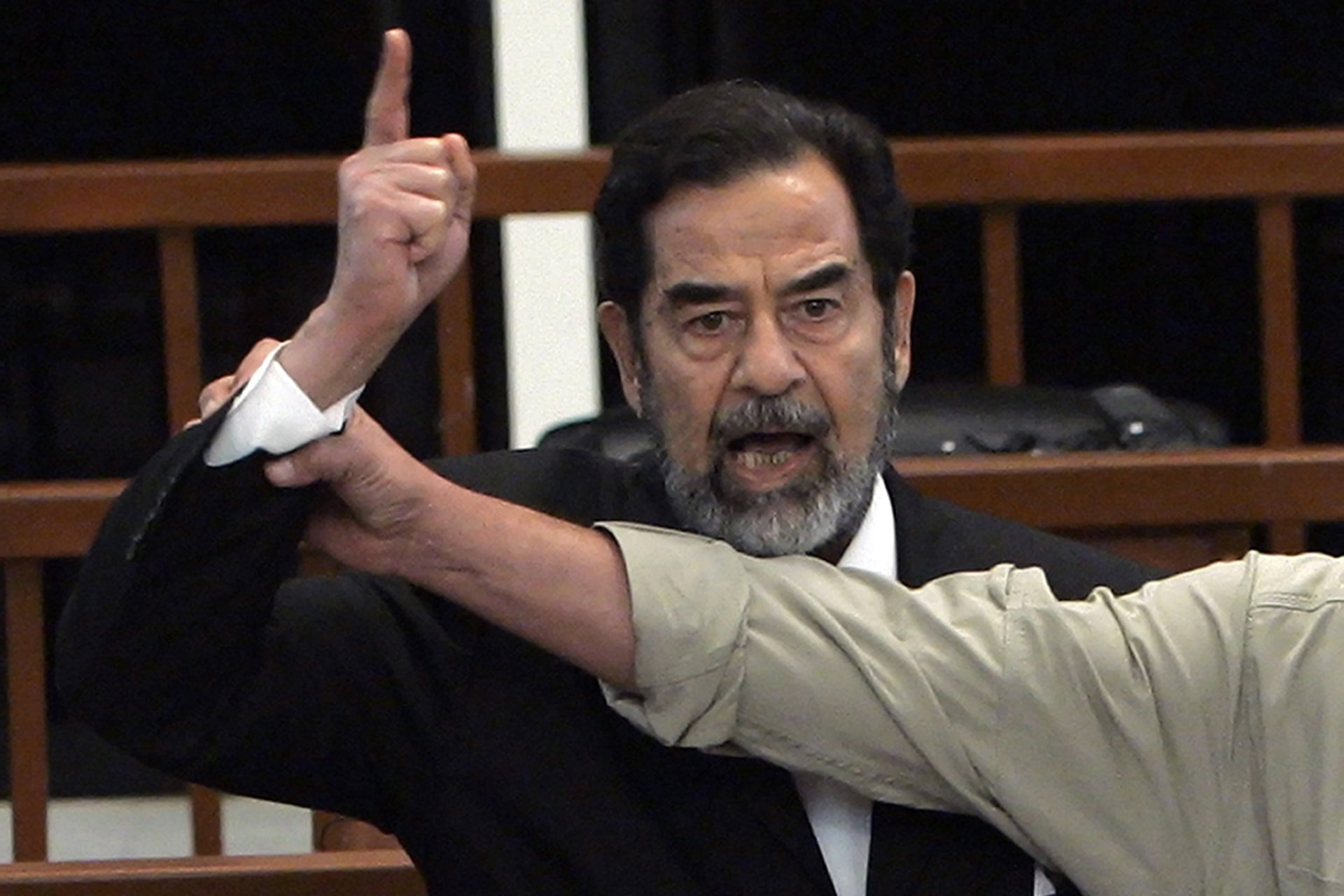 Saddam reacts to the court’s verdict. 
