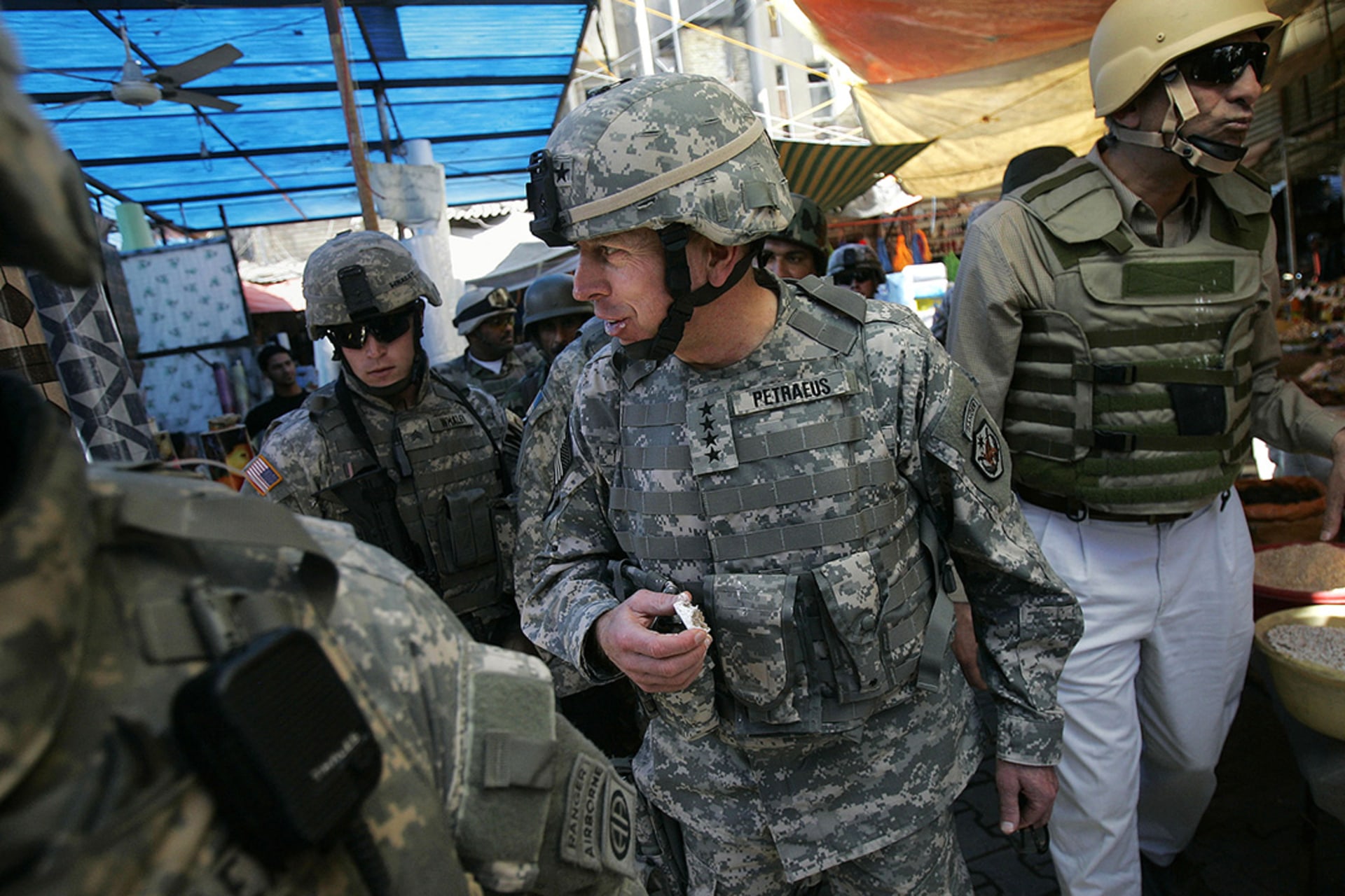 U.S. General David Petraeus and his entourage visit Baghdad’s Shorja market.