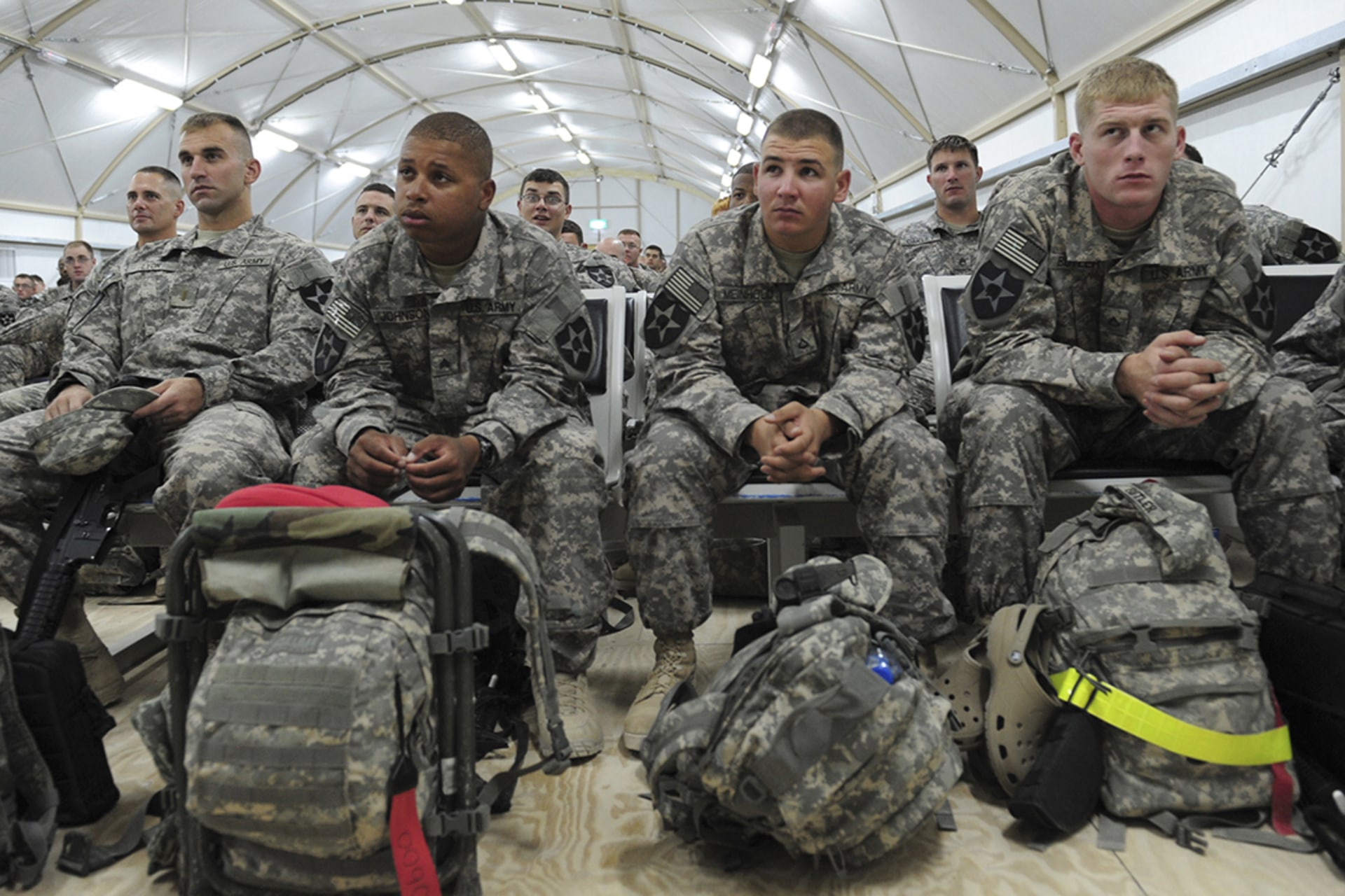 U.S. soldiers await their flight back to the United States at Camp Virginia in Kuwait.