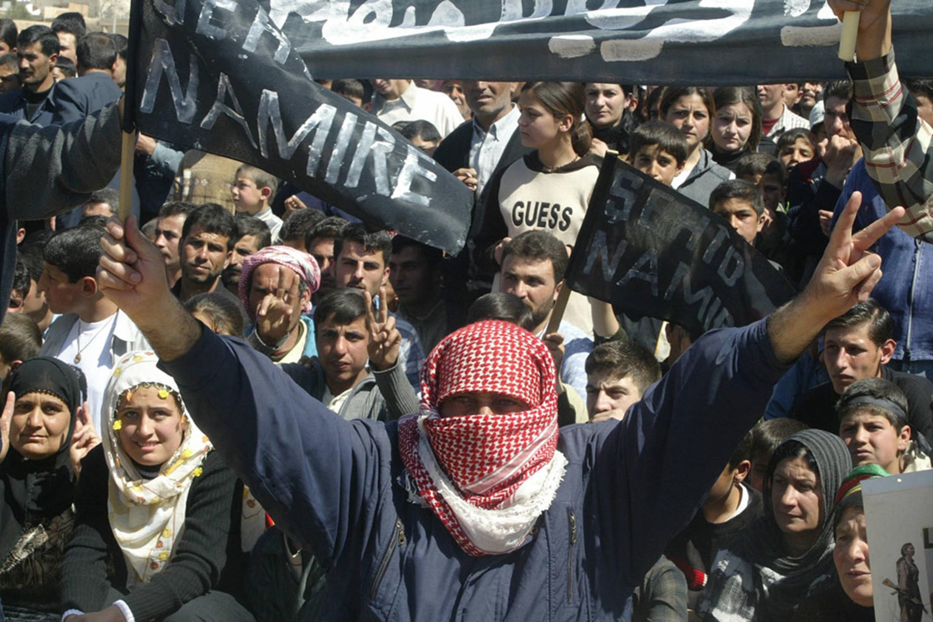 Kurdish demonstrators in Qamishli, Syria, protest the arrest of PKK leader Ocalan on March 21, 2004.