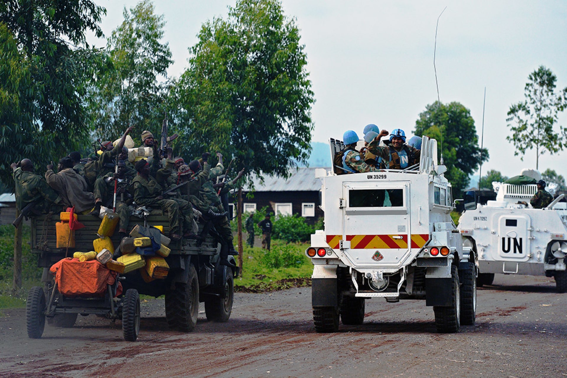 Congolese forces and members of the UN Force Intervention Brigade celebrate during a mission near Goma in September 2013. Carl de Souza/AFP/Getty Images