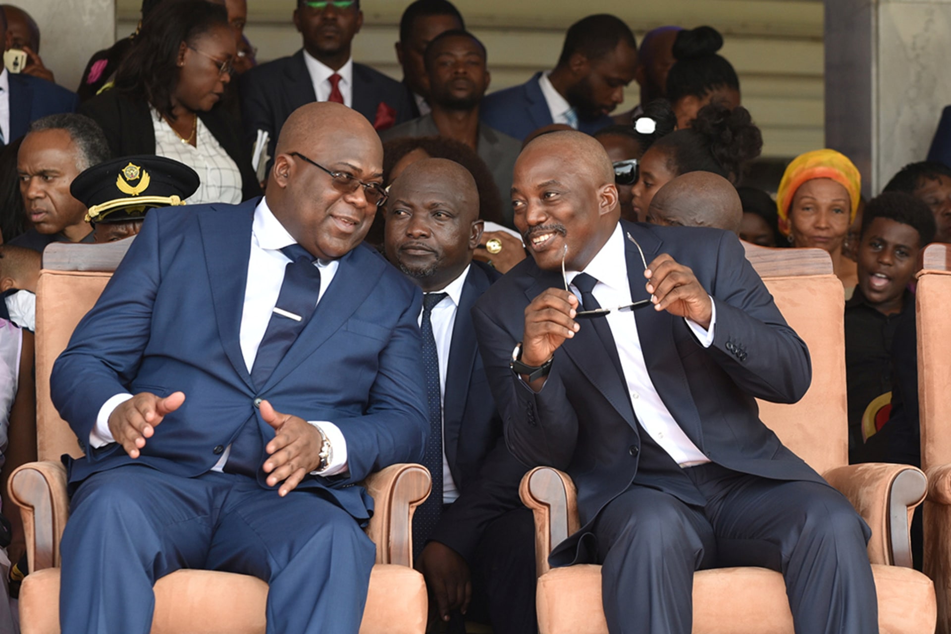 Félix Tshisekedi sits next to Kabila at his inauguration ceremony on January 24, 2019. Olivia Acland/Reuters