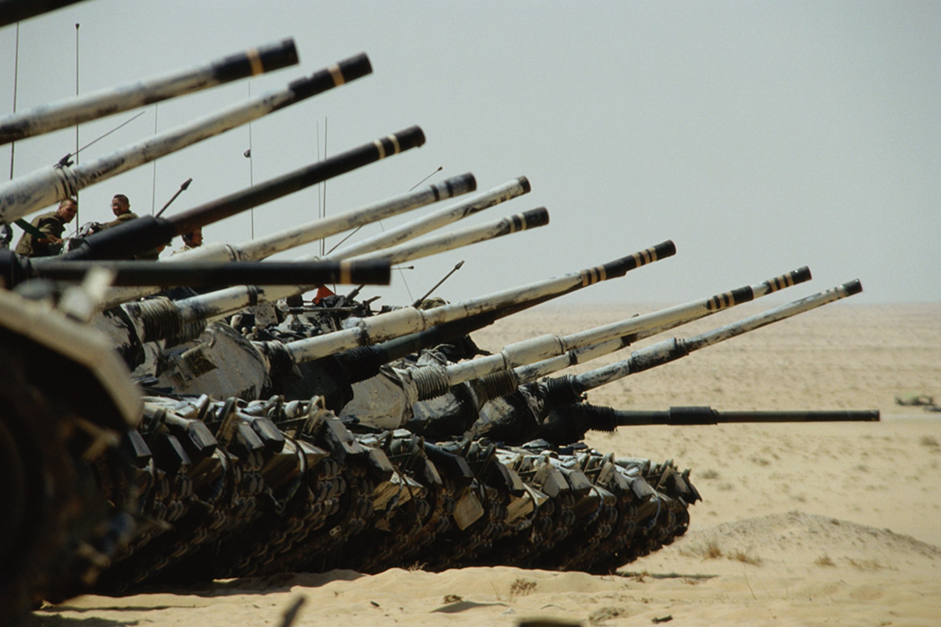 U.S. troops man tanks in the Saudi desert during the Gulf War.