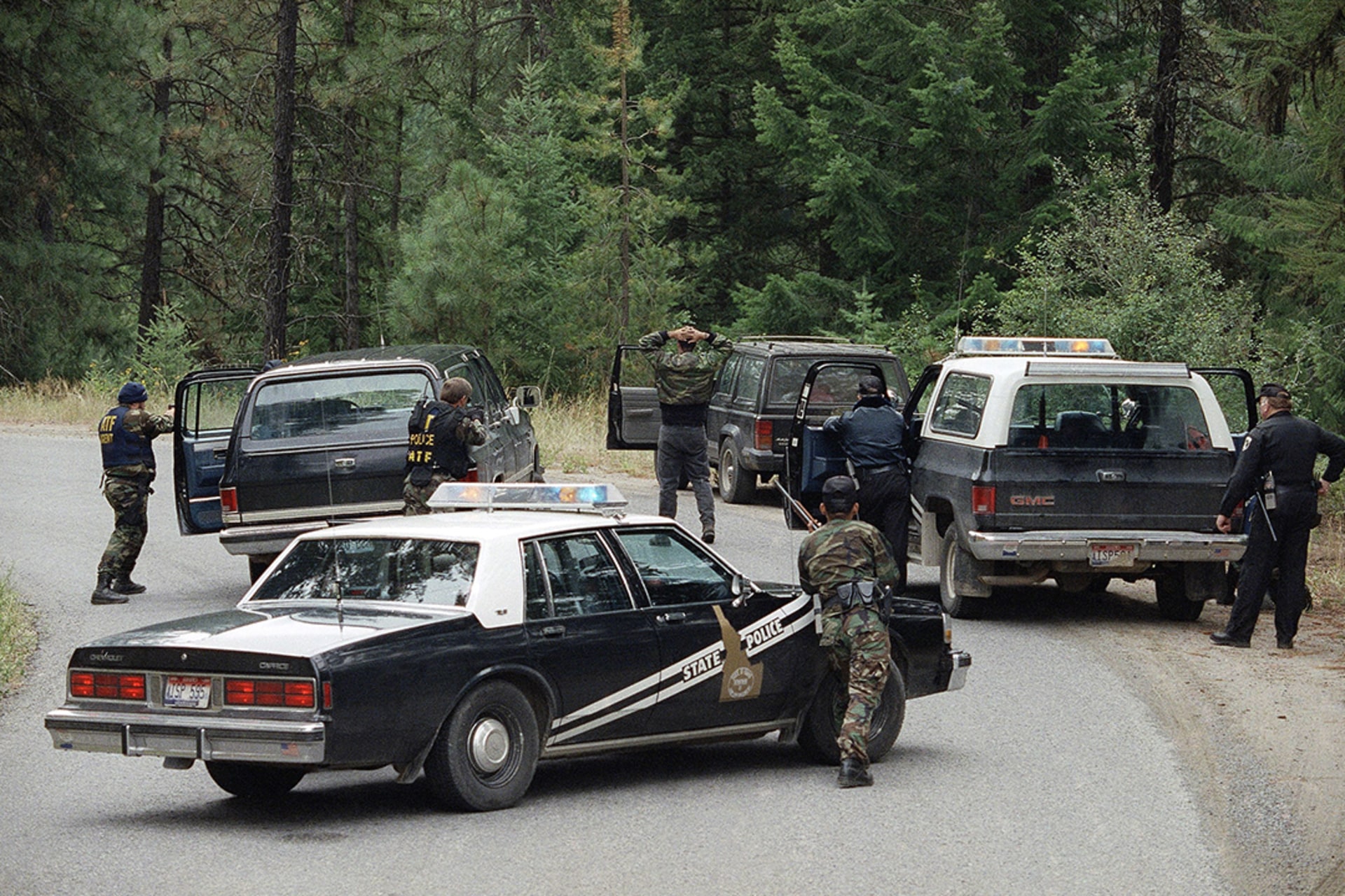 Federal agents draw their weapons on five neo-Nazis a few miles from the Ruby Ridge site in Idaho, where Randy Weaver is engaged in a standoff with authorities.