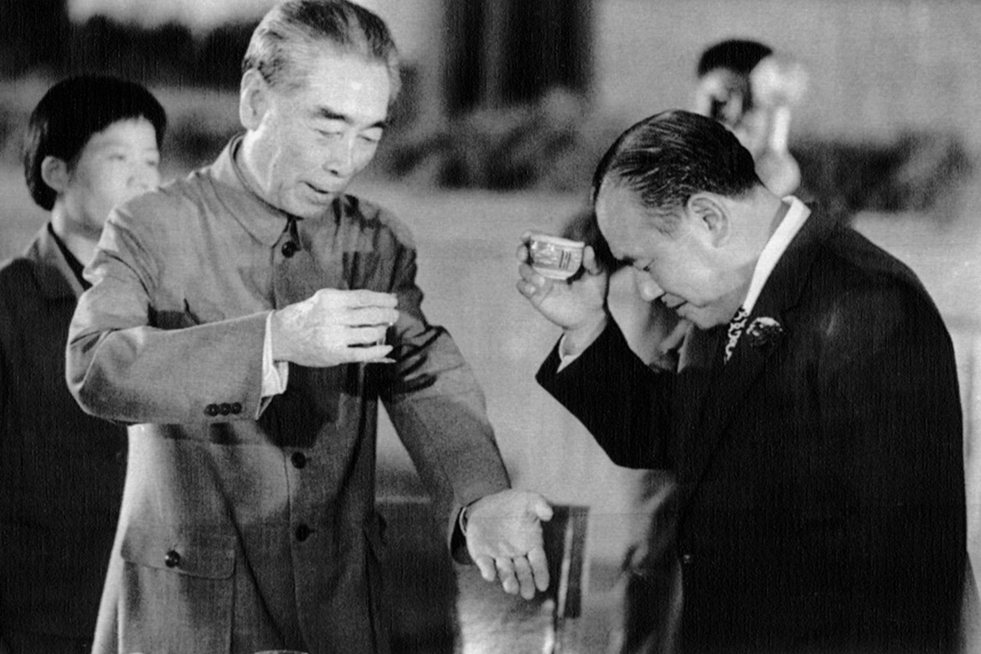 Japanese Prime Minister Kakuei Tanaka and Chinese Premier Zhou Enlai toast to reconciliation on September 28, 1972. Bettmann/Corbis/AP Photo