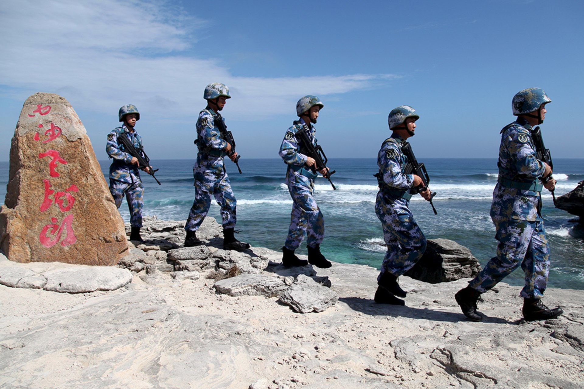 Chinese naval personnel patrol Woody Island in 2016. Reuters