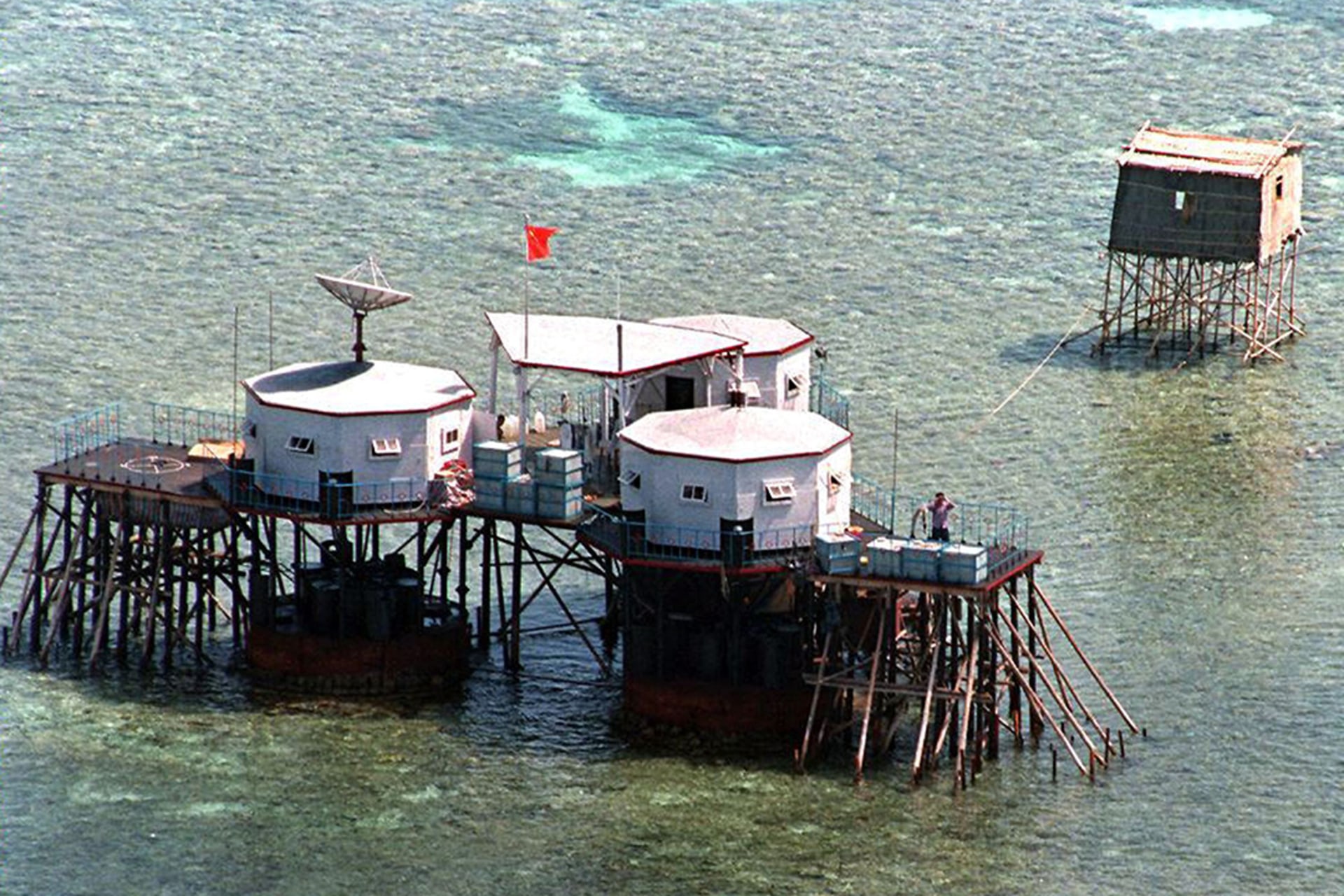 An April 1995 aerial photo shows a manned outpost equipped with a Chinese-built satellite dish in Mischief Reef. Romeo Gacad/AFP/Getty Images