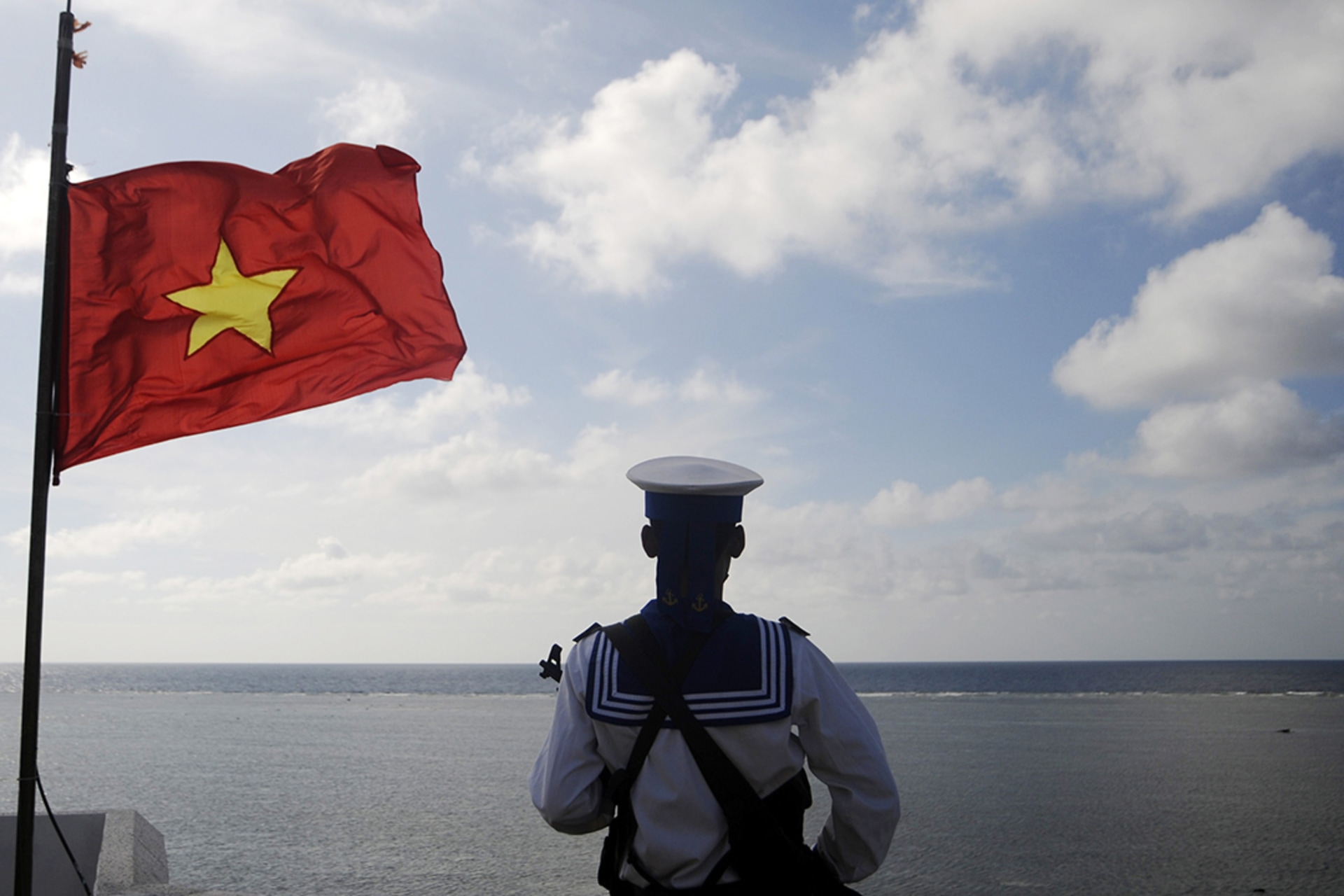 A Vietnamese seaman stands guard at Thuyen Chai Island in the Spratly archipelago. Quang Le/Reuters