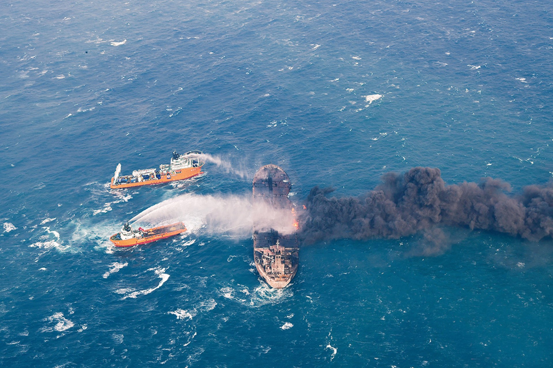 Rescue crews attempt to extinguish the fire on the Sanchi oil taker in the East China Sea. China Daily/Reuters