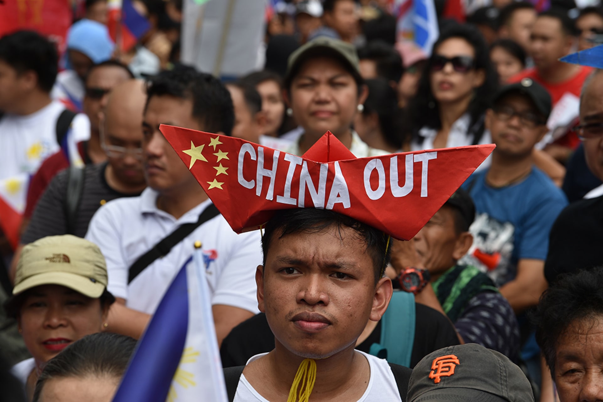 People protest against China outside the Chinese consular office in Manila. Ted Aljibe/AFP/Getty Images