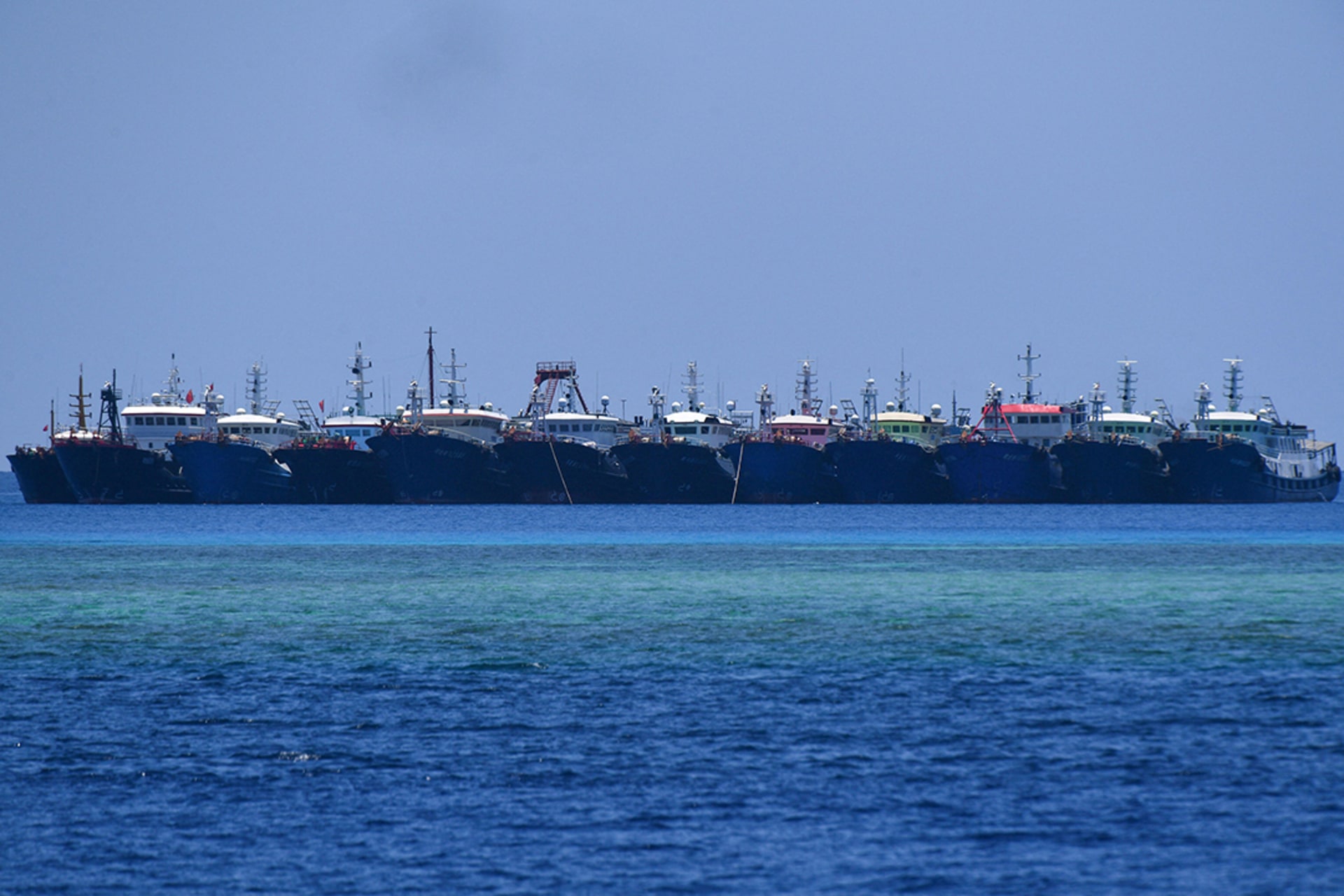 Chinese vessels are moored at Whitsun Reef in the Spratly Islands. Ted Aljibe AFP/Getty Images