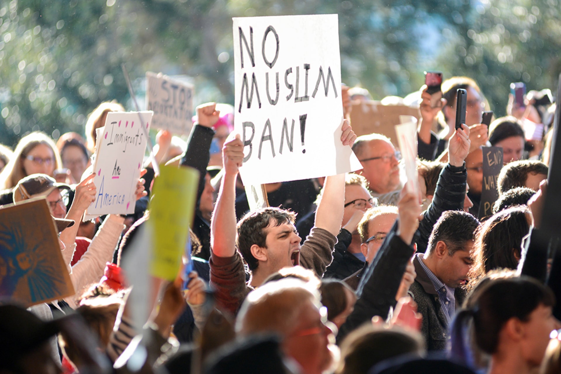 Demonstrators protest outside San Francisco International Airport. Kate Munsch/Reuters