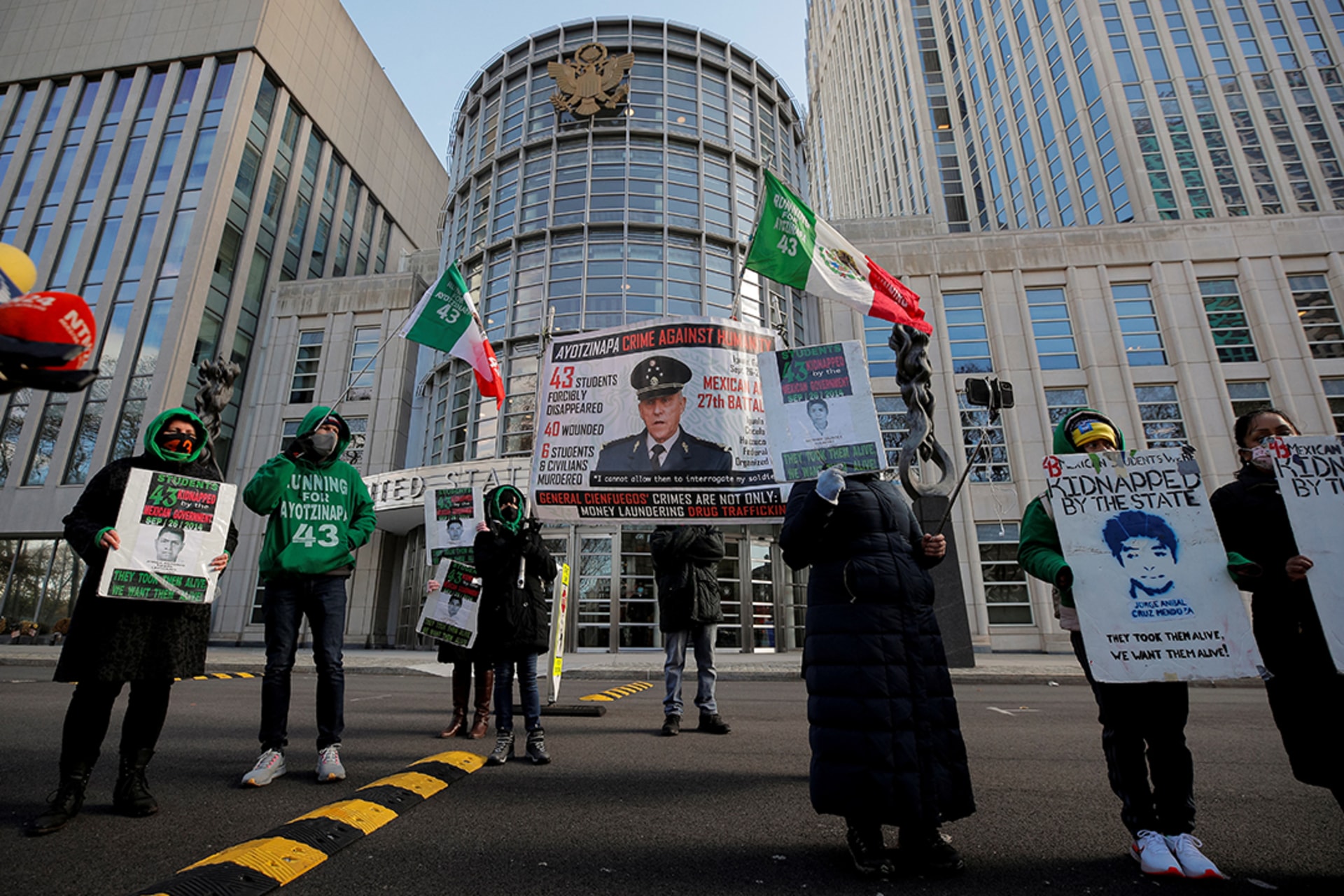 Demonstrators outside the Brooklyn Federal Courthouse in New York protest the U.S. government’s decision to drop drug charges against former Mexican defense minister Salvador Cienfuegos in November 2020. Brendan McDermid/Reuters
