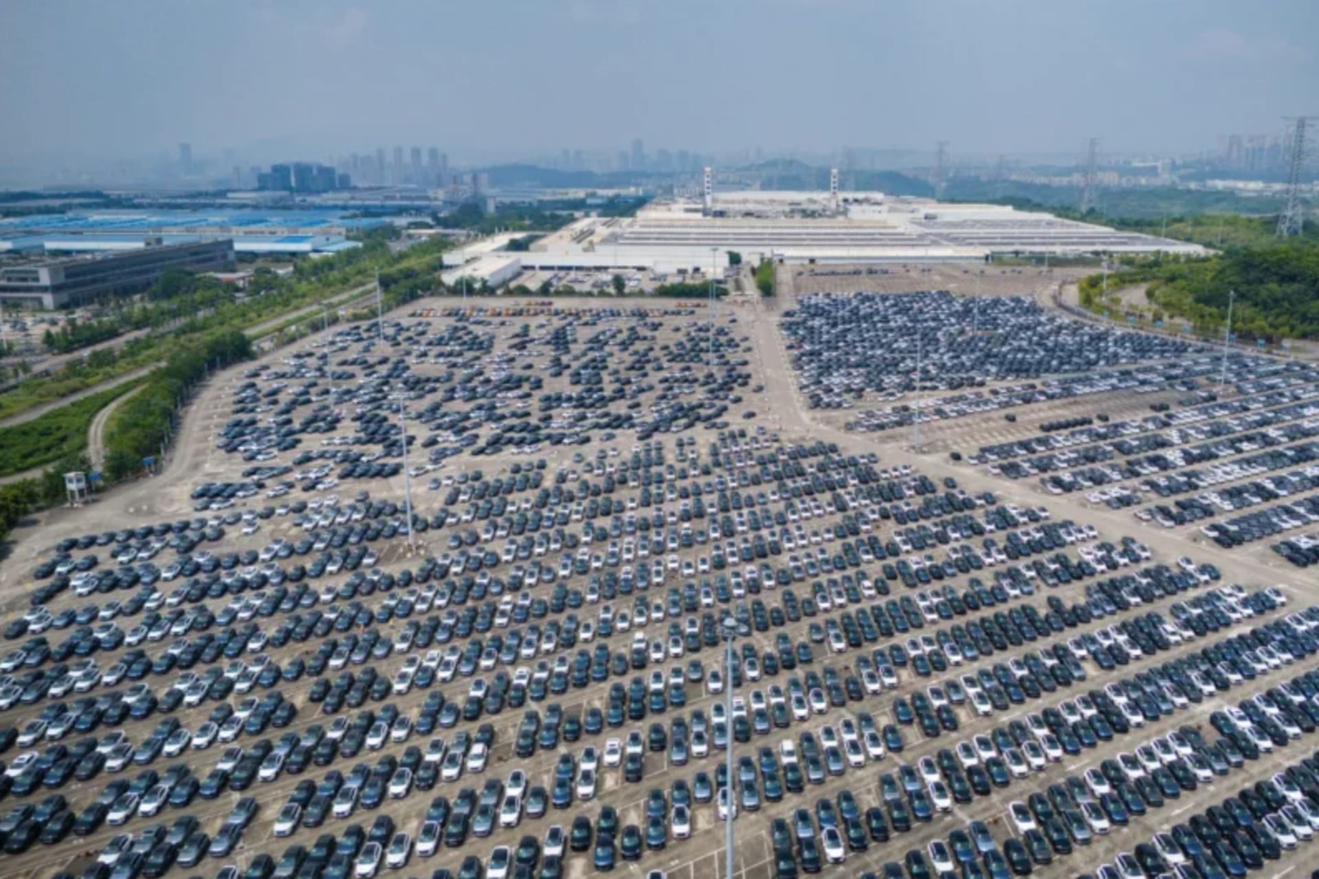 <p>Rows of new energy vehicles are being seen at the Changan Ford car park in Chongqing, China, on June 15, 2024.</p>
