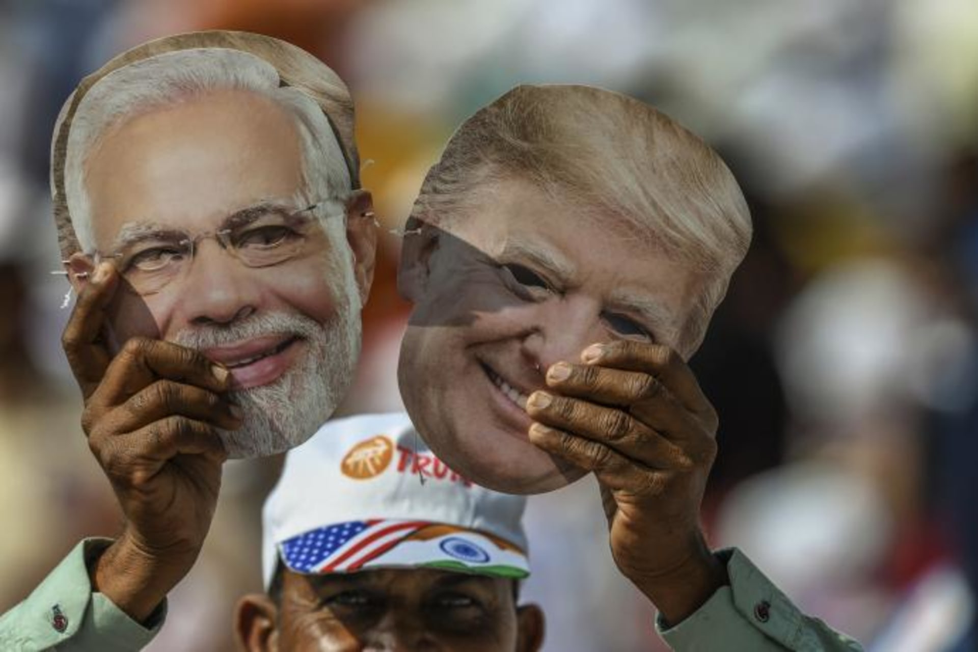 <p>Masks of Prime Minister Narendra Modi and President Donald Trump in Ahmedabad, India, February 2020.</p>
