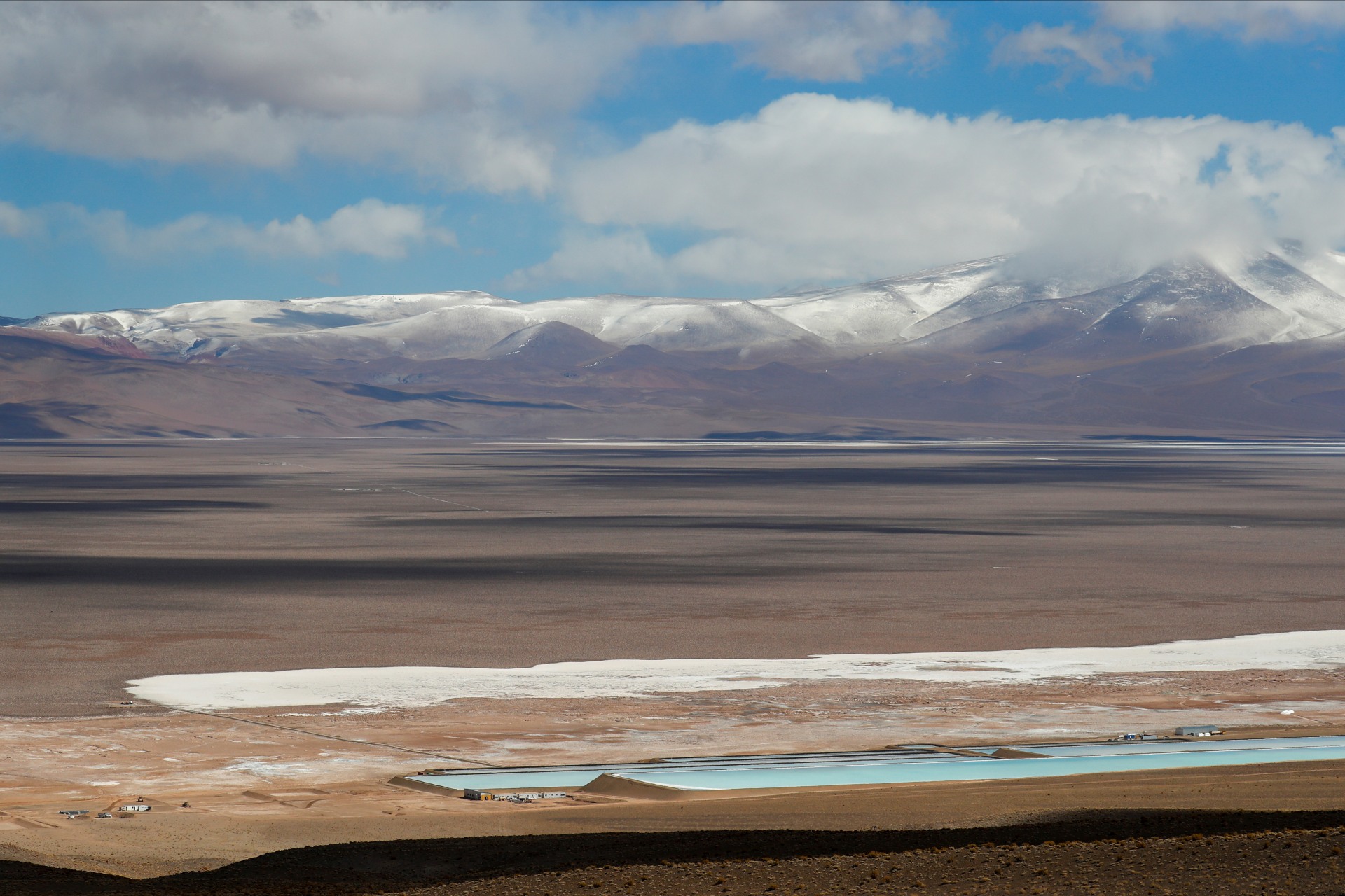 Brine pools used to extract lithium are seen next to a lithium mining camp at the Salar del Rincon salt flat, in Salta, Argentina. Picture taken August 12, 2021. REUTERS/Agustin Marcarian