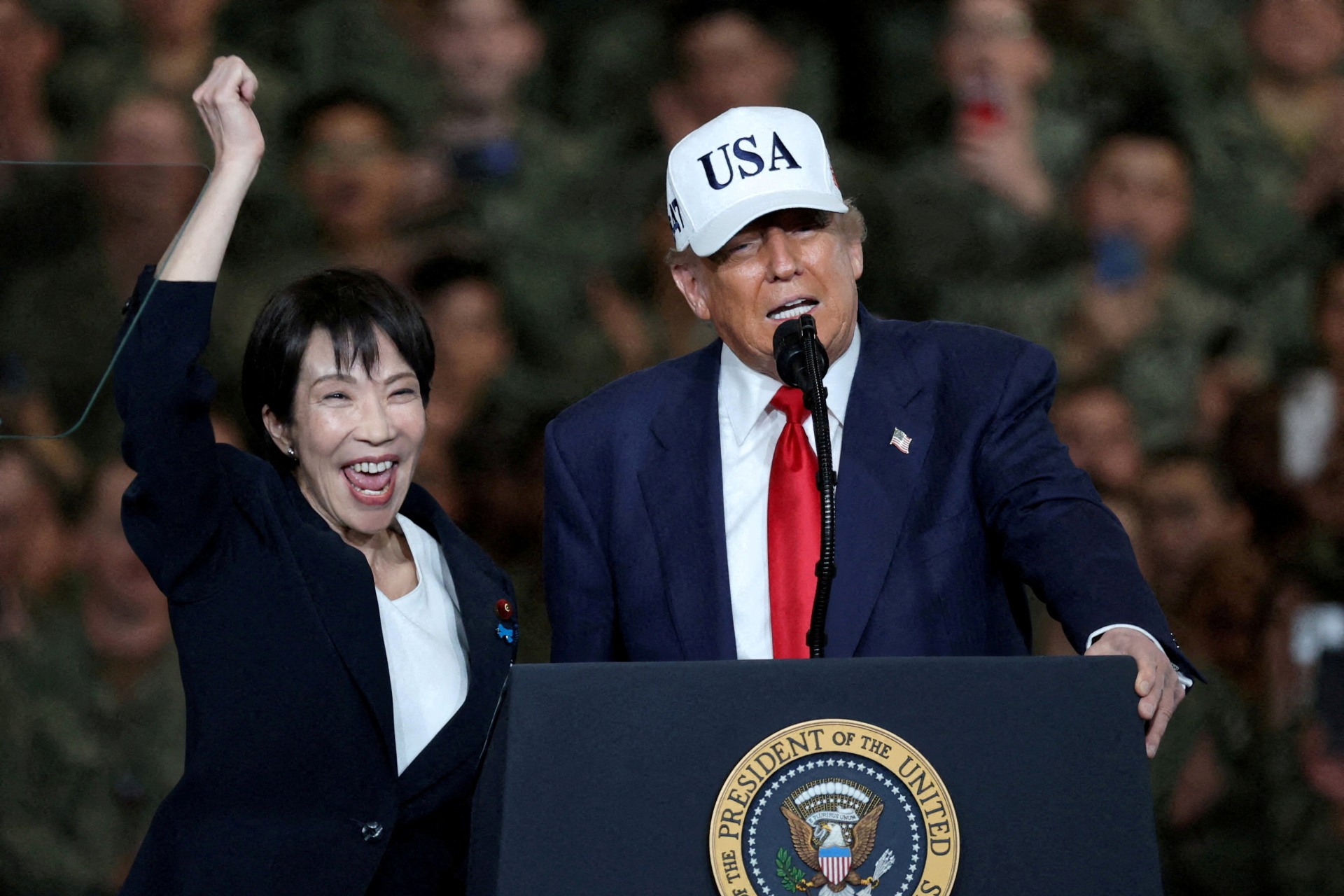 U.S. President Donald Trump and Japanese Prime Minister Sanae Takaichi visit the U.S. Navy's Yokosuka base