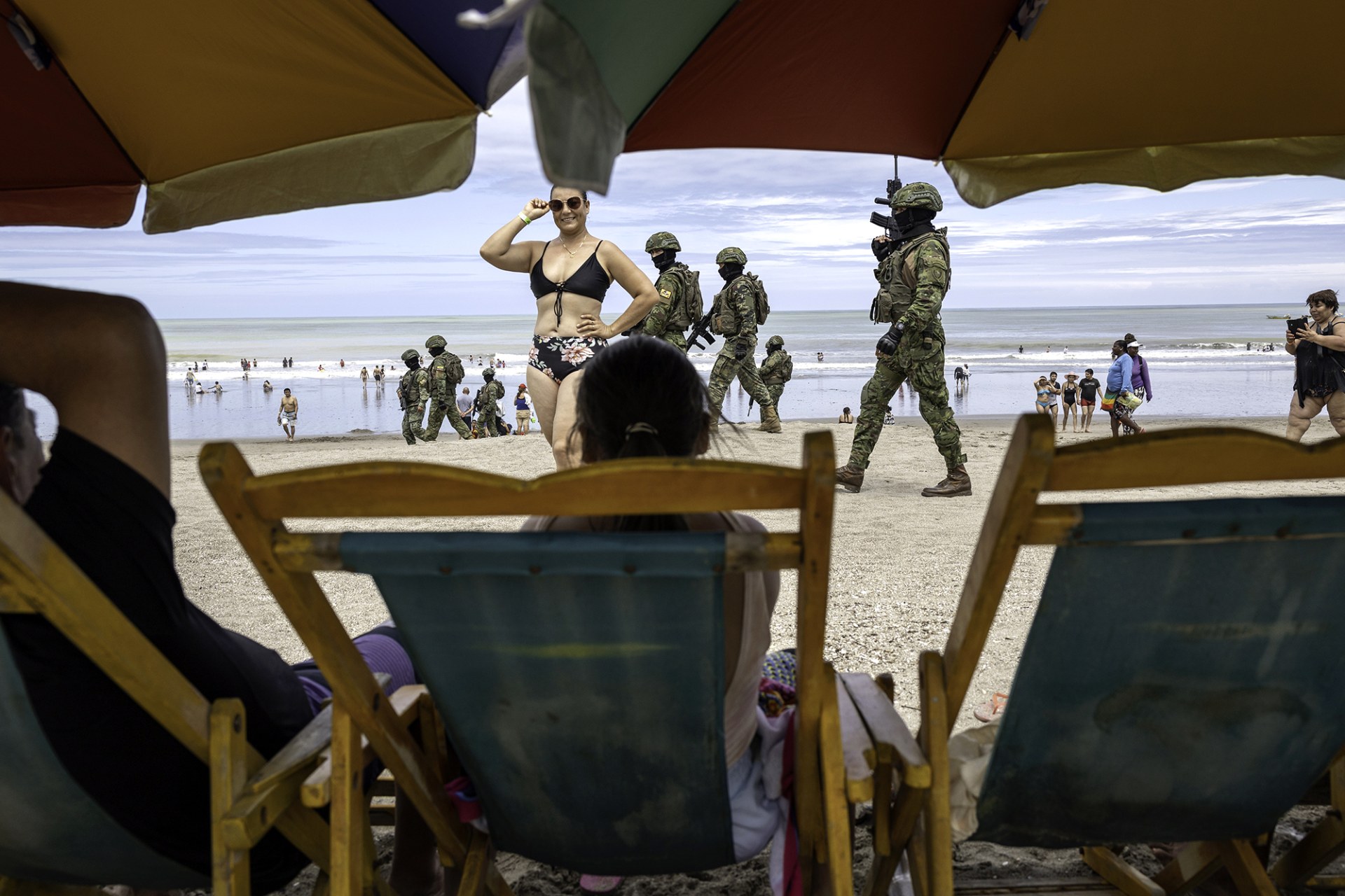 <p>ATACAMES, ECUADOR: Soldiers patrol the beach during Carnival celebrations in February 2024, as the government says the violent crime rate is dropping. <span class="immersive-image__figcaption-credit">John Moore/Getty Images</span></p>
