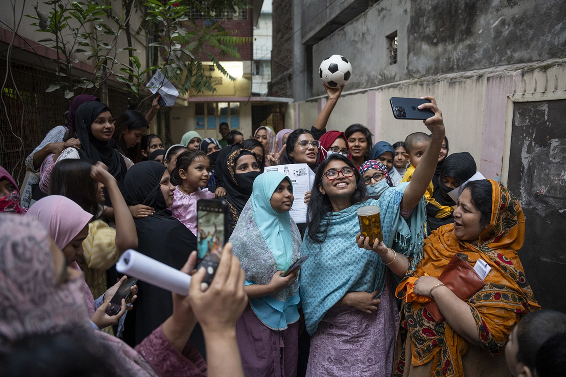 Image of Bengali women taking a selfie.