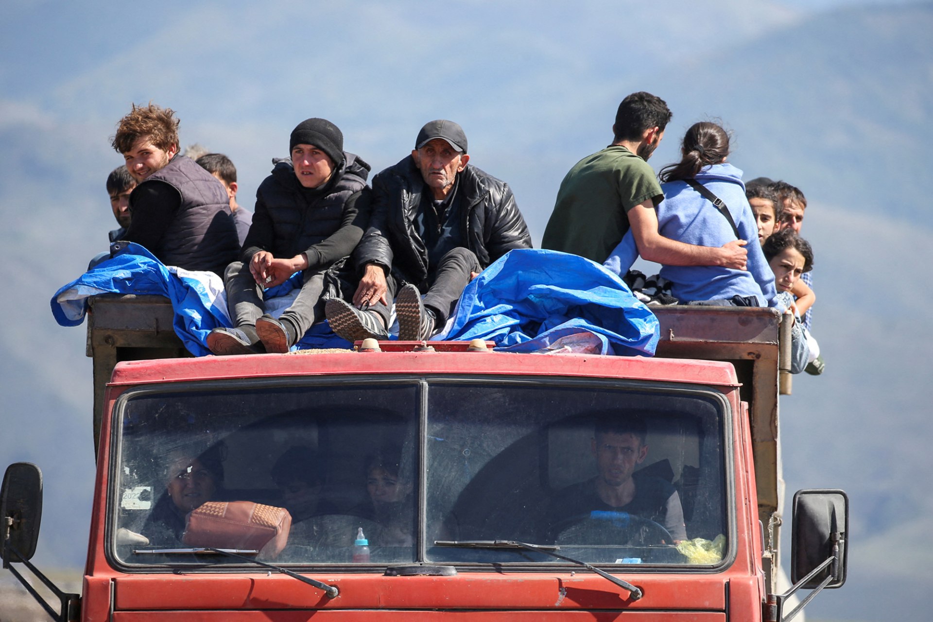 <p>KORNIDZOR, ARMENIA: Refugees evacuating from Nagorno-Karabakh arrive in neighboring Armenia. Irakli Gedenidze/Reuters</p>
