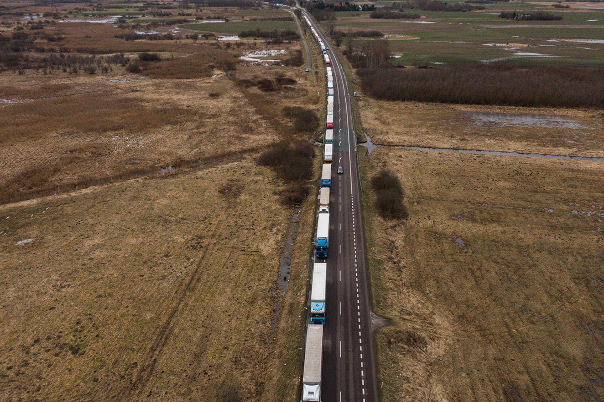 <p>DOROHUSK, POLAND: Thousands of Polish trucks form a blockade at a major Polish-Ukrainian border crossing to protest grain imports, in February 2024. <span class="immersive-image__figcaption-credit">Omar Marques/Getty Images</span></p>
