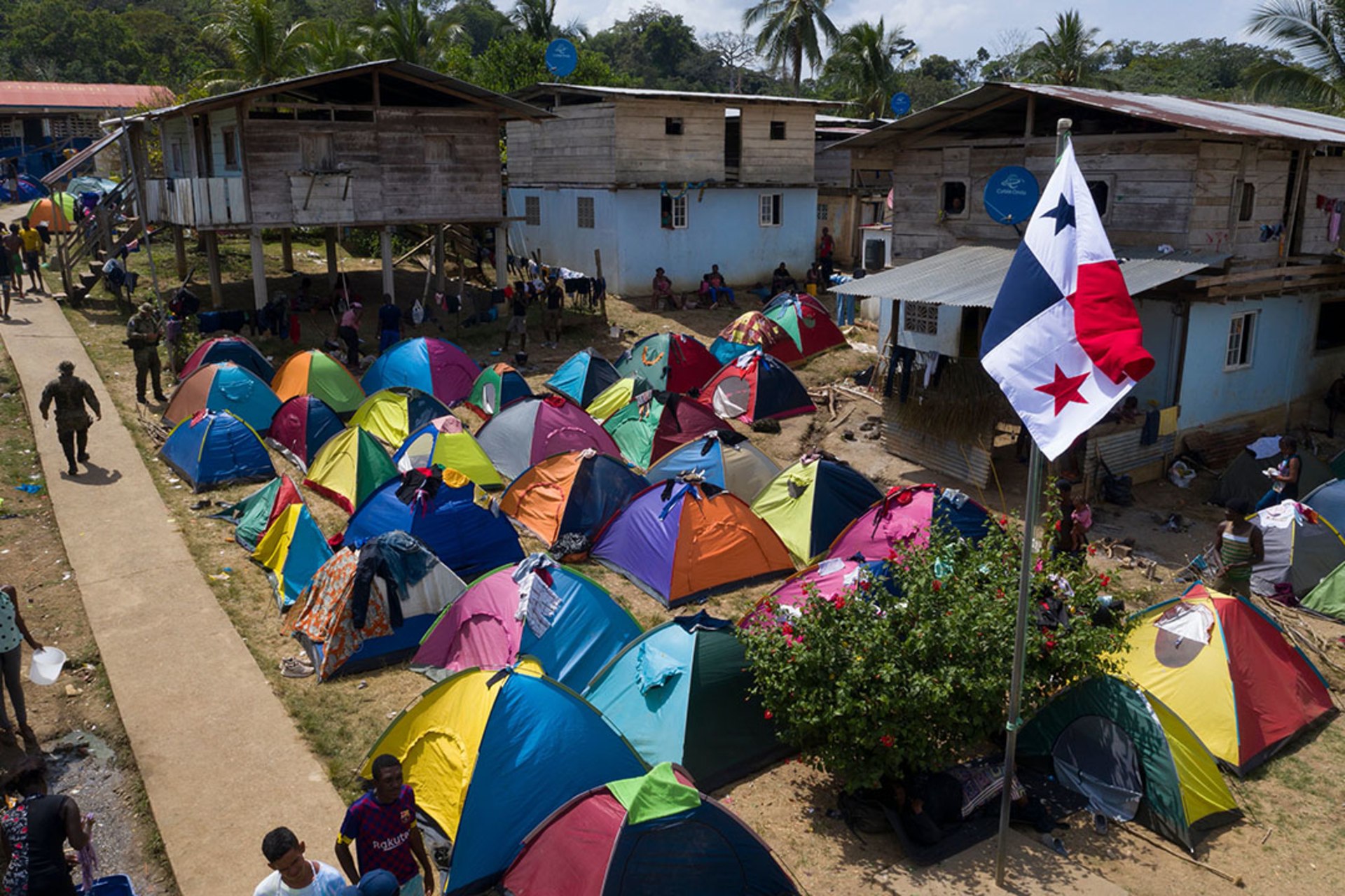 Aerial view of multi-colored tents in Bajo Chiquito village migrant camp.