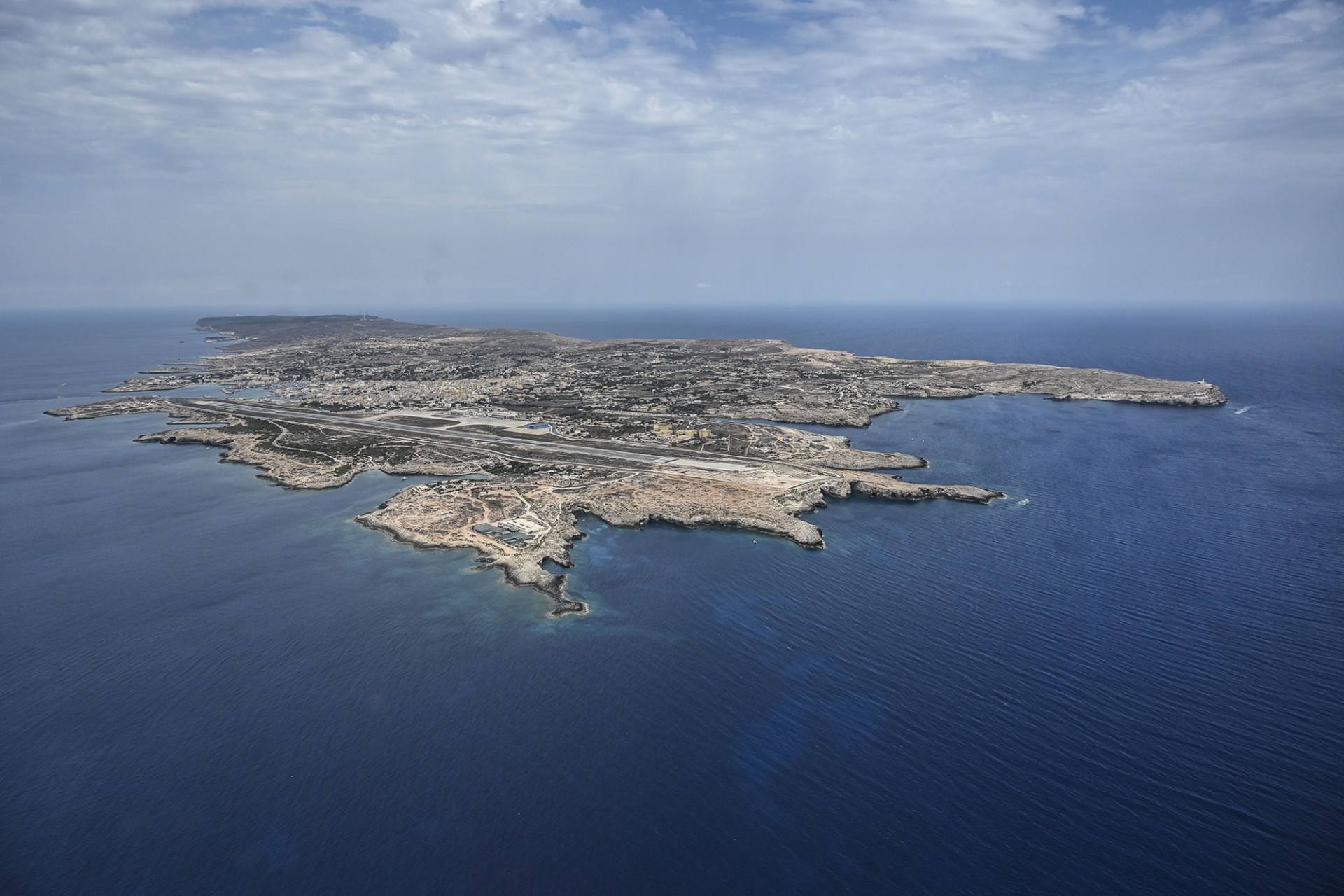<p>LAMPEDUSA, ITALY: With an area of roughly eight square miles (twenty square kilometers), Lampedusa has a population of only about six thousand people. <span class="immersive-image__figcaption-credit">Fabrizio Villa/Getty Images</span></p>