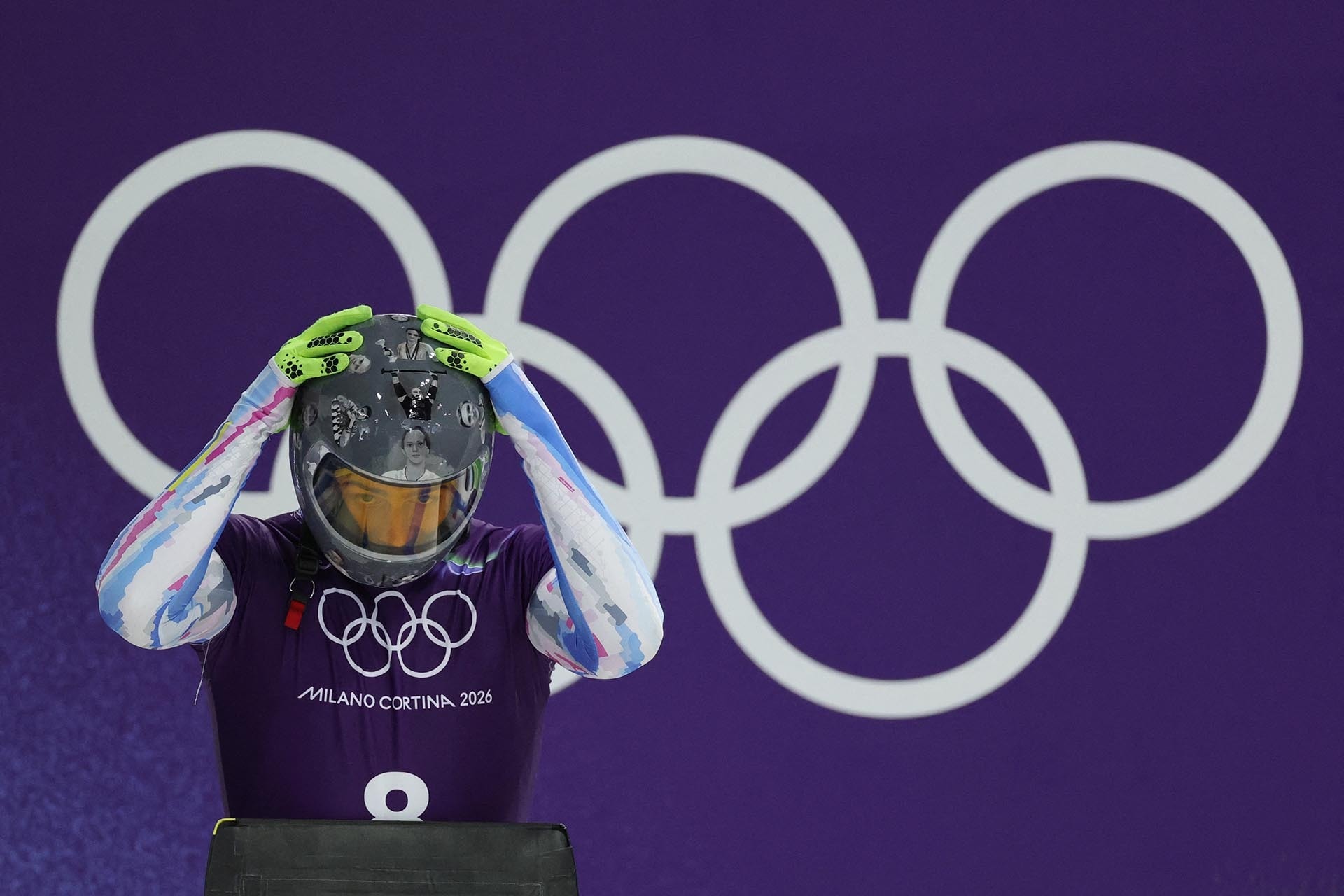 Ukrainian skeleton athlete Vladyslav Heraskevych wears a helmet in tribute to athletes who have died from Russia's war.