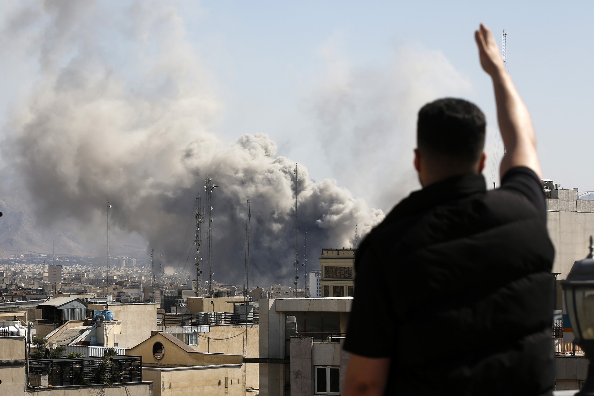 Plumes of smoke rise over the residential areas of the Iranian capital following airstrikes amid ongoing U.S.–Israel attacks as multiple explosions are heard across the city in Tehran.