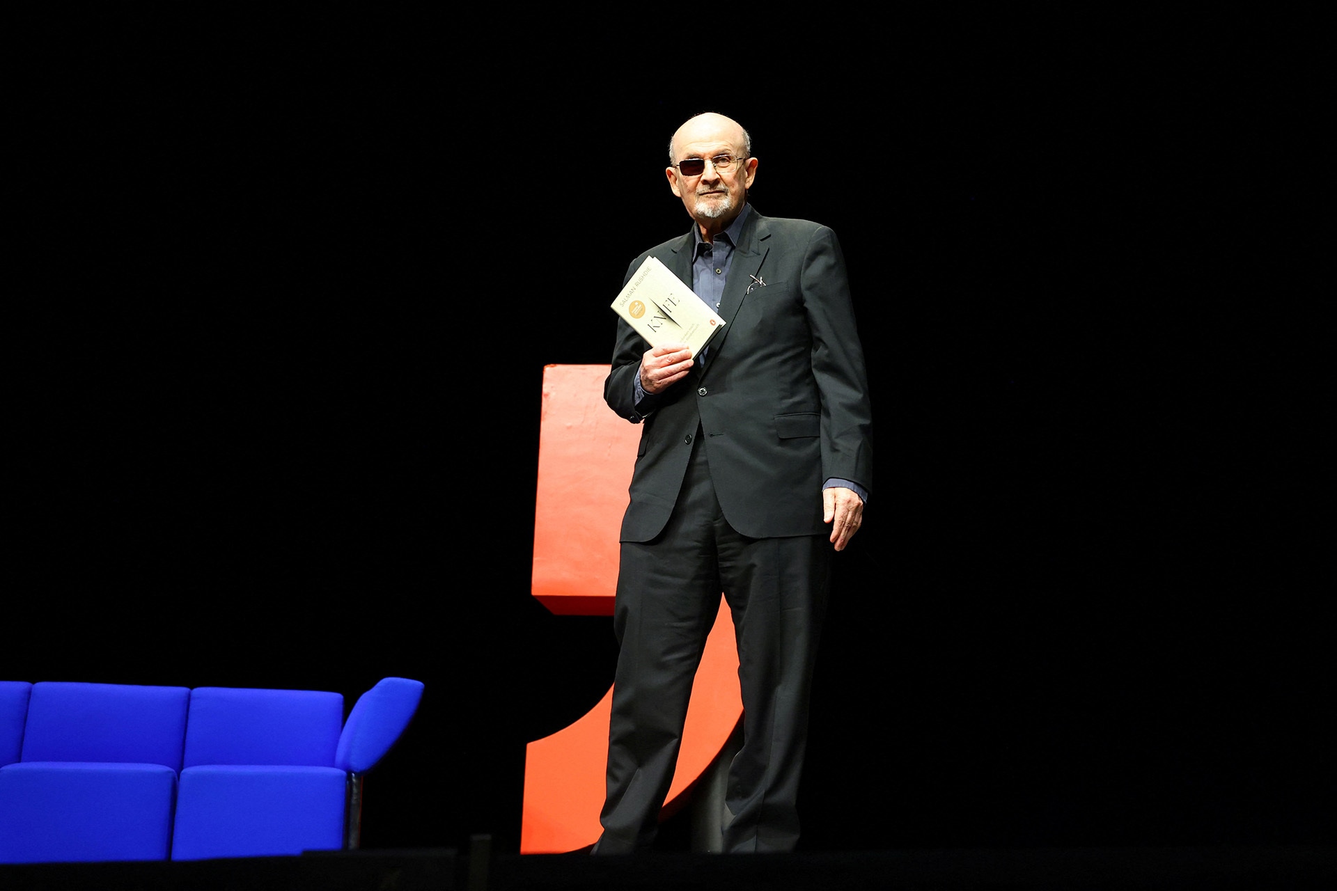 Author Salman Rushdie poses during a photocall ahead of the presentation of his book "Knife: Meditations After an Attempted Murder" at the Deutsches Theater in Berlin, Germany.