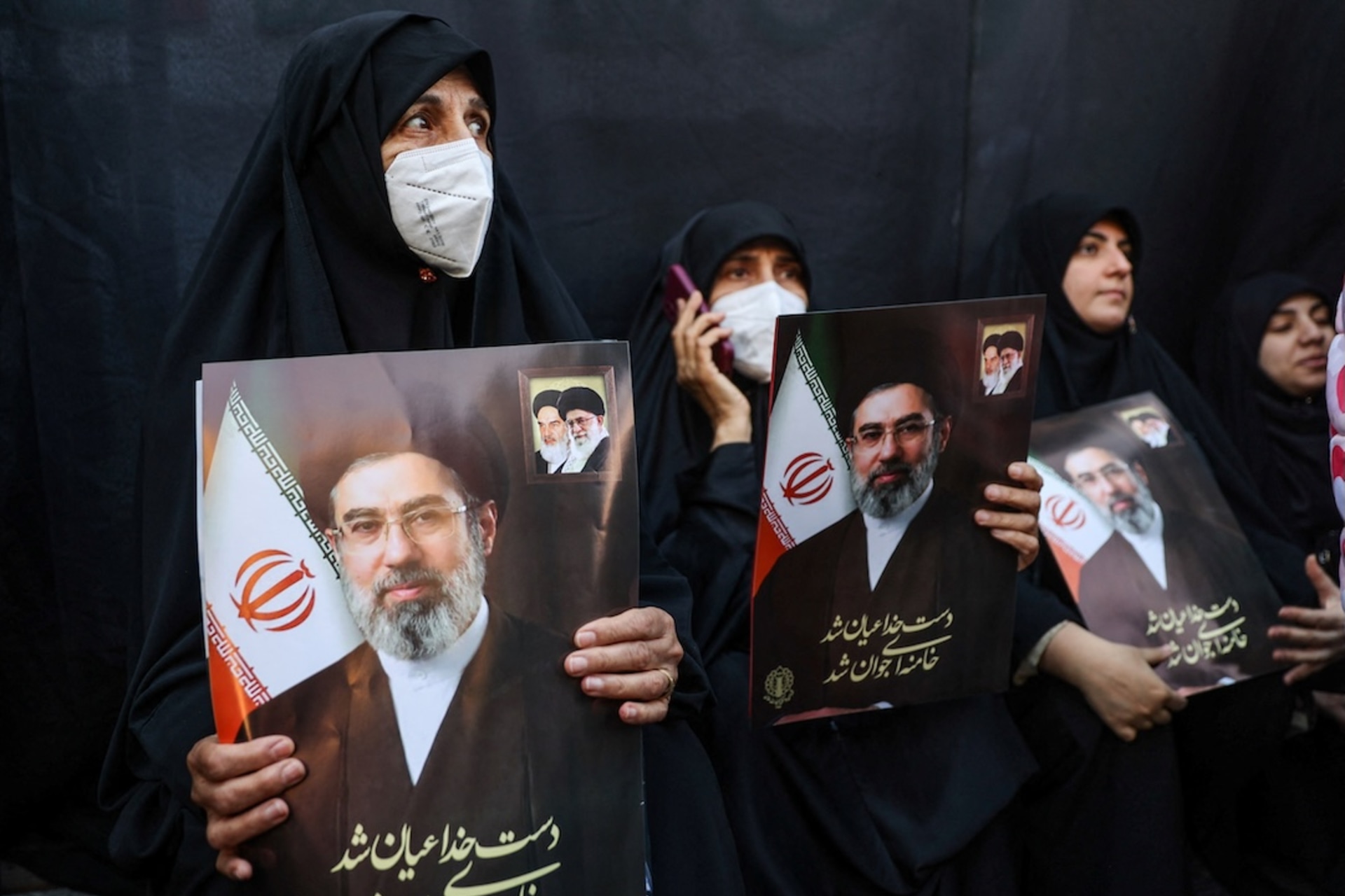 <p>People hold placards with images of Iran’s new supreme leader Mojtaba Khamenei during a gathering to support him, amid the U.S.-Israeli conflict with Iran, in Tehran, Iran, March 9, 2026. </p>