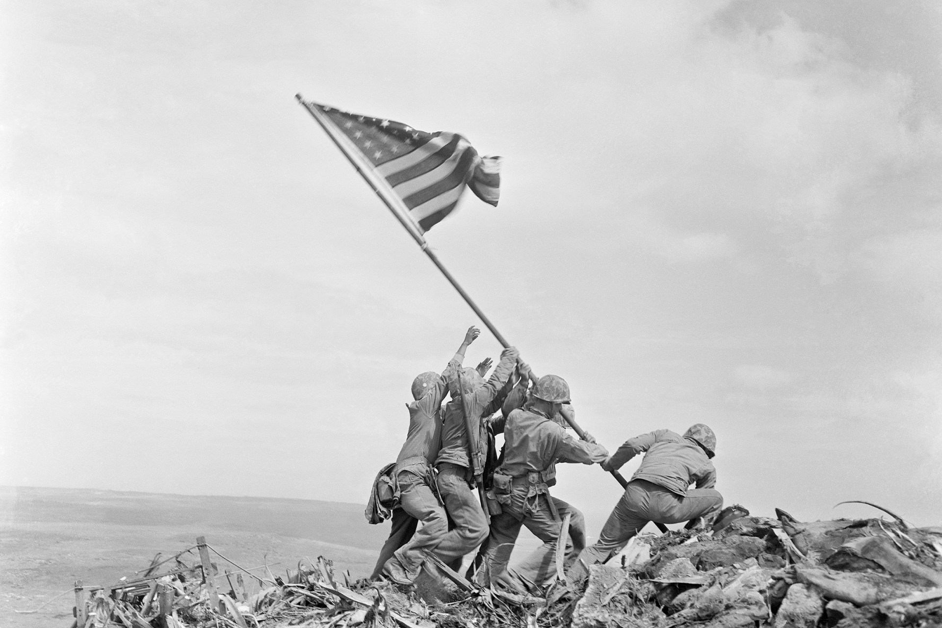 <p>Marines raise the U.S. flag atop Mount Suribachi during the Battle of Iwo Jima on February 23, 1945.</p>
