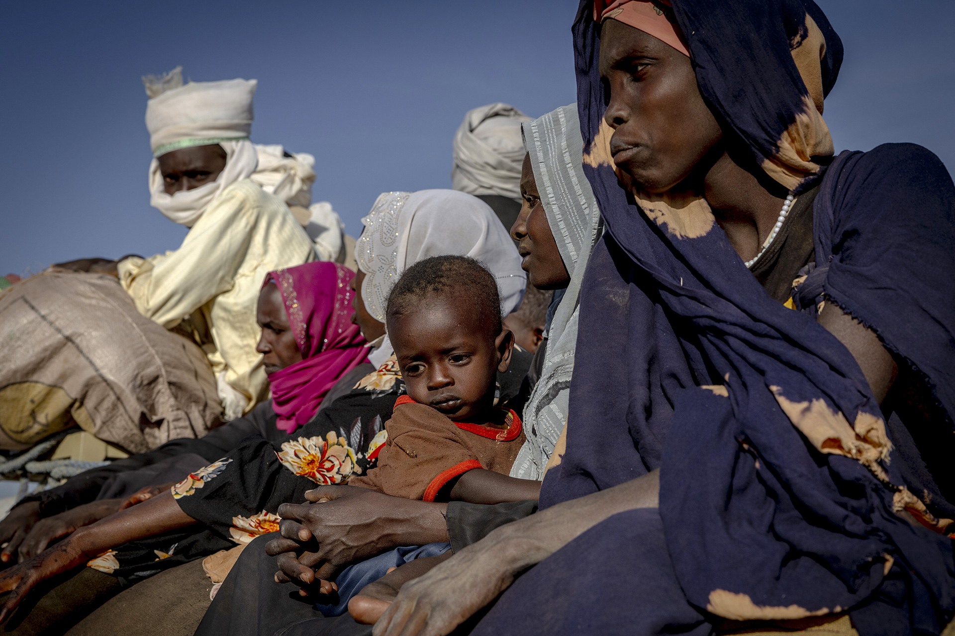 <p>Exhausted and covered in dust, a truck full of Sudanese refugees arrive on the outskirts of Oure Cassoni refugee camp in eastern Chad on November 30, 2025.</p>