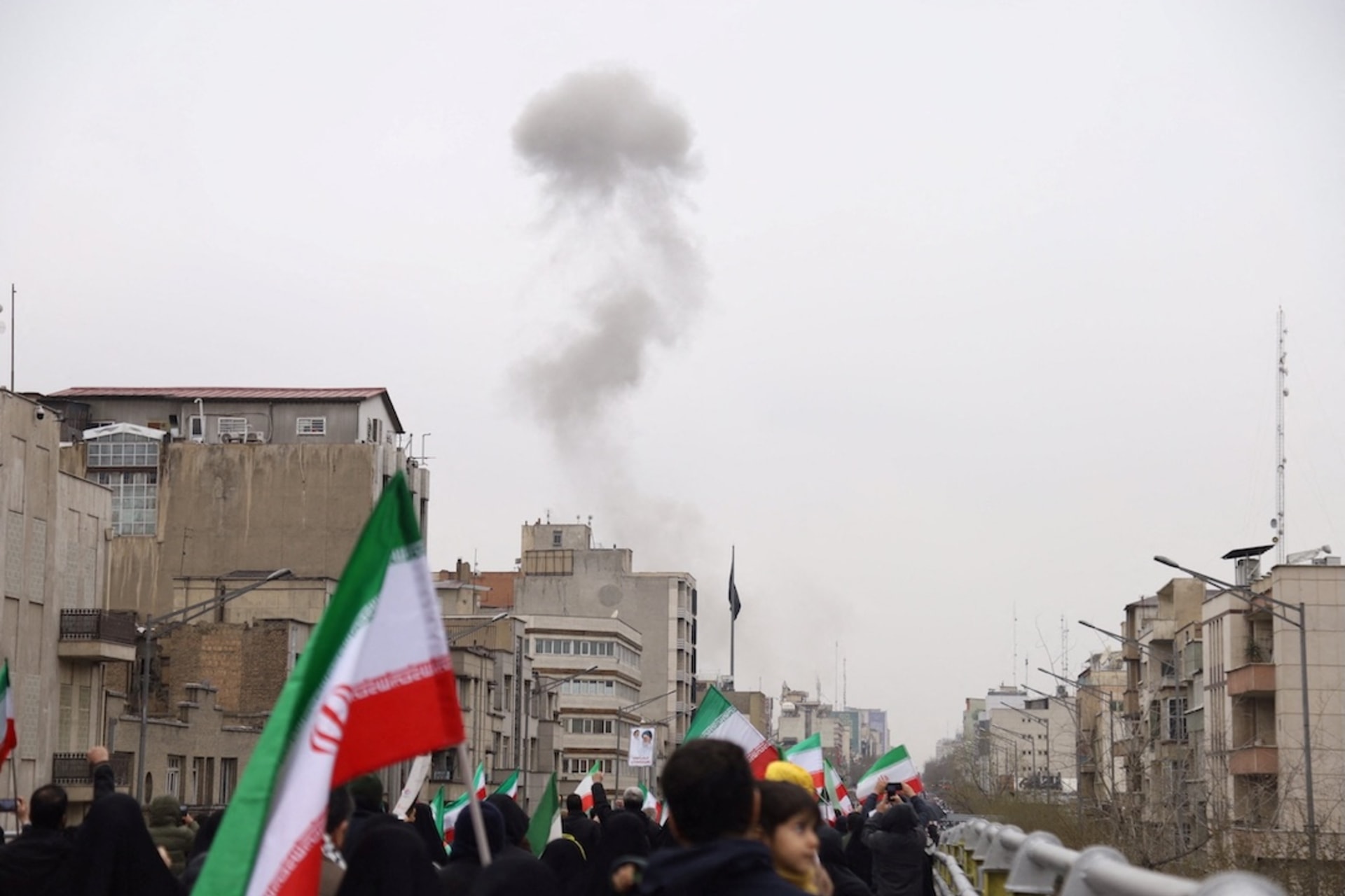 <p>Smoke rises following an explosion during a protest marking the annual al-Quds Day (Jerusalem Day) on the last Friday of the holy month of Ramadan, amid the U.S.-Israeli conflict with Iran, in Tehran, Iran, March 13, 2026. </p>
