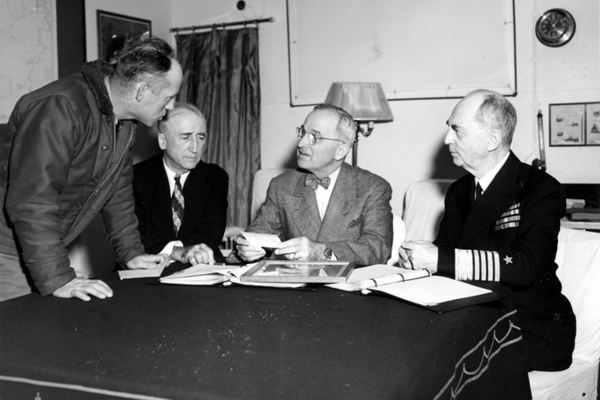 <p>President Harry S. Truman confers with Secretary of State James Byrnes and Admiral William Leahy in preparation for the Potsdam Conference onboard the <i>USS Augusta</i>, July 12, 1945.</p>
