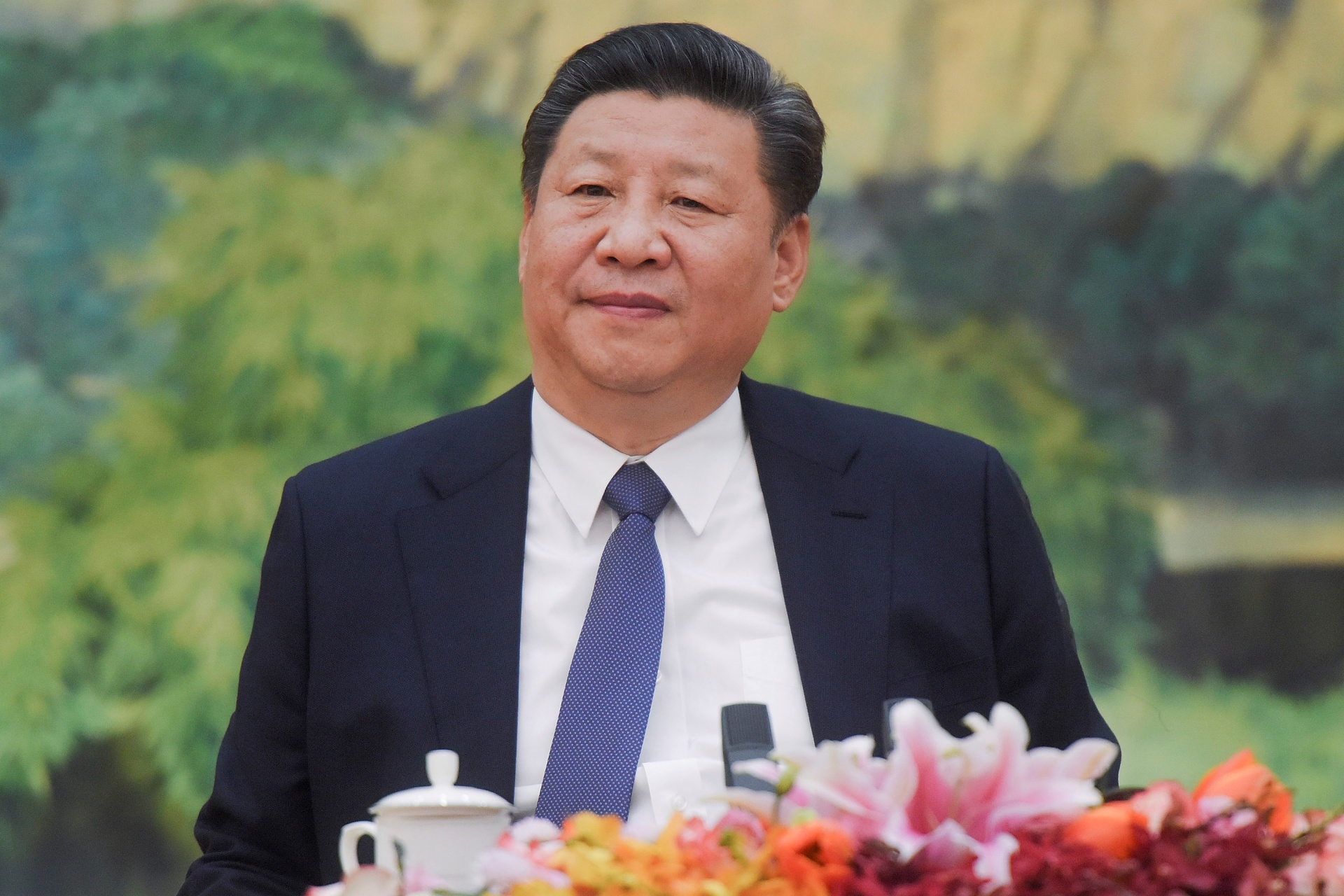 Chinese President Xi Jinping attends a meeting at the Great Hall of The People in Beijing