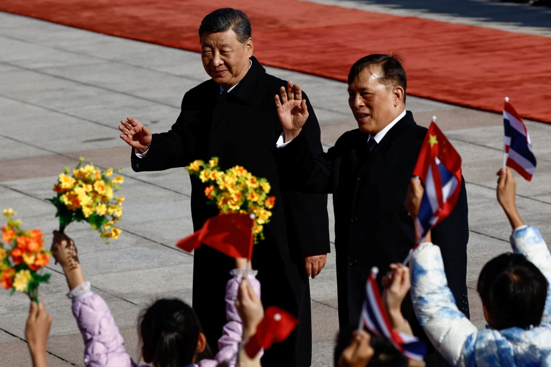 Thailand’s King Maha Vajiralongkorn and Chinese President Xi Jinping attend a welcoming ceremony at the Great Hall of the People, in Beijing, China, on November 14, 2025. (Tingshu Wang/Pool via Reuters)