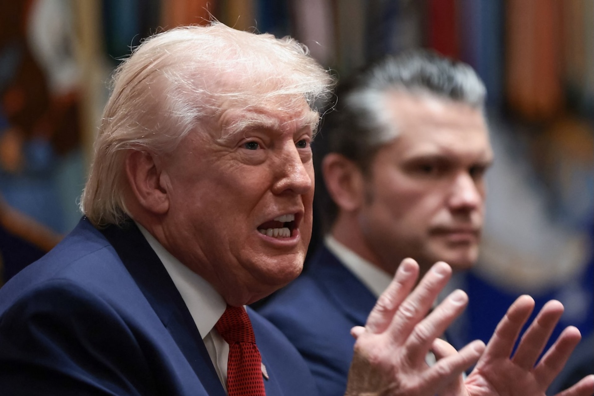 <p>U.S. President Donald Trump speaks next to Defense Secretary Pete Hegseth during a cabinet meeting at the White House in Washington, D.C., U.S., March 26, 2026.</p>
