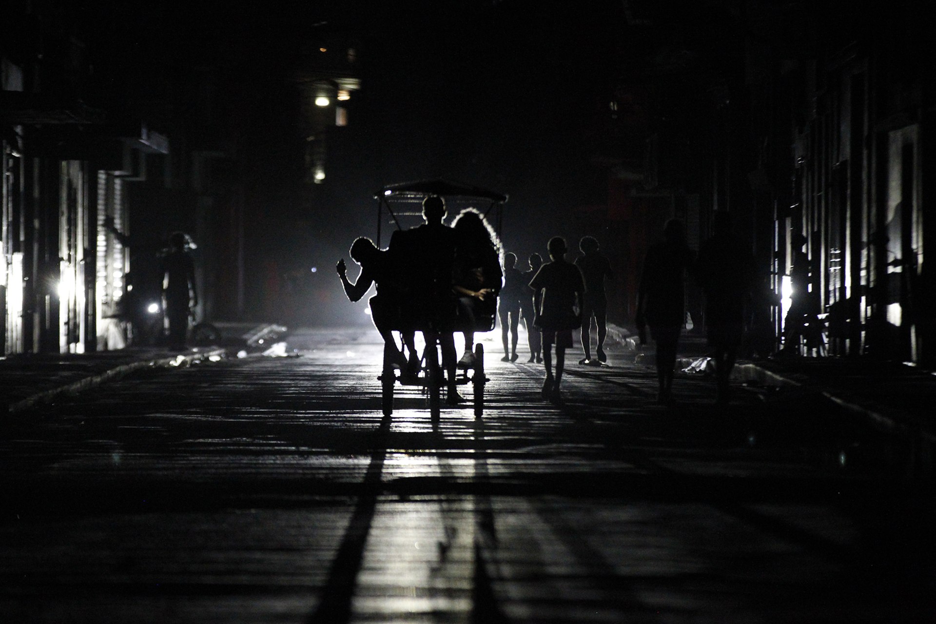 <p>People ride a local taxi down a street during the most recent blackout in Havana, Cuba, on March 21, 2026.</p>