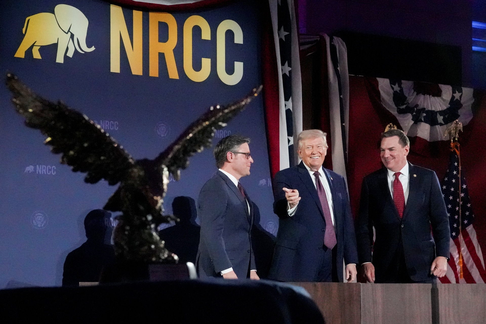 <p>President Donald Trump, House Speaker Mike Johnson (R-LA), and Rep. Richard Hudson (R-NC), the chair of the National Republican Congressional Committee, at a fundraising dinner, March 25, 2026.</p>
