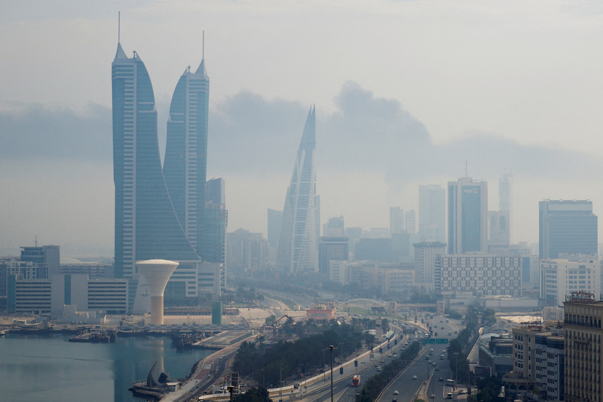 Smoke rises following a strike on Bahrain airport on Muharraq Island