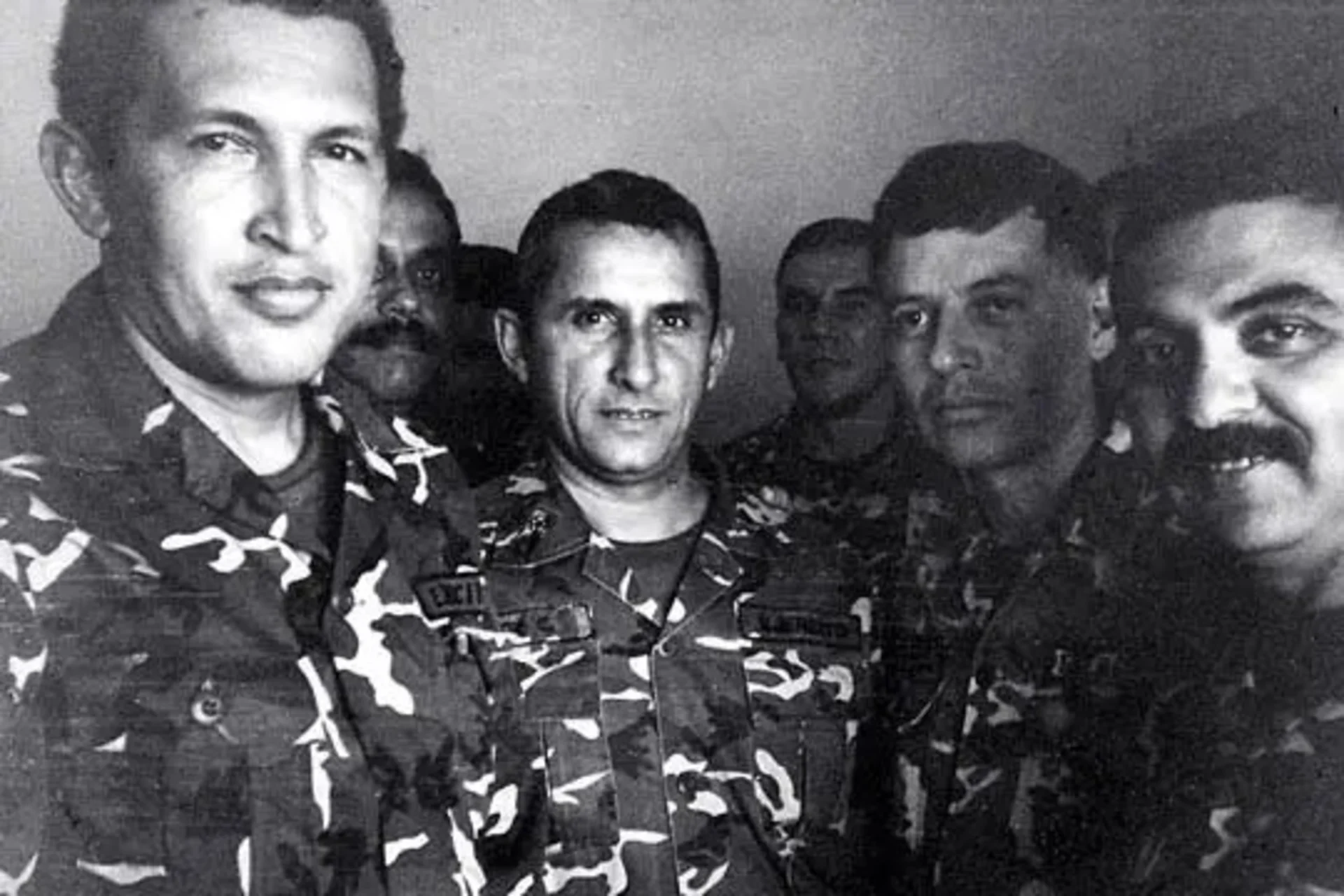 Chavez (left) and others in prison.
