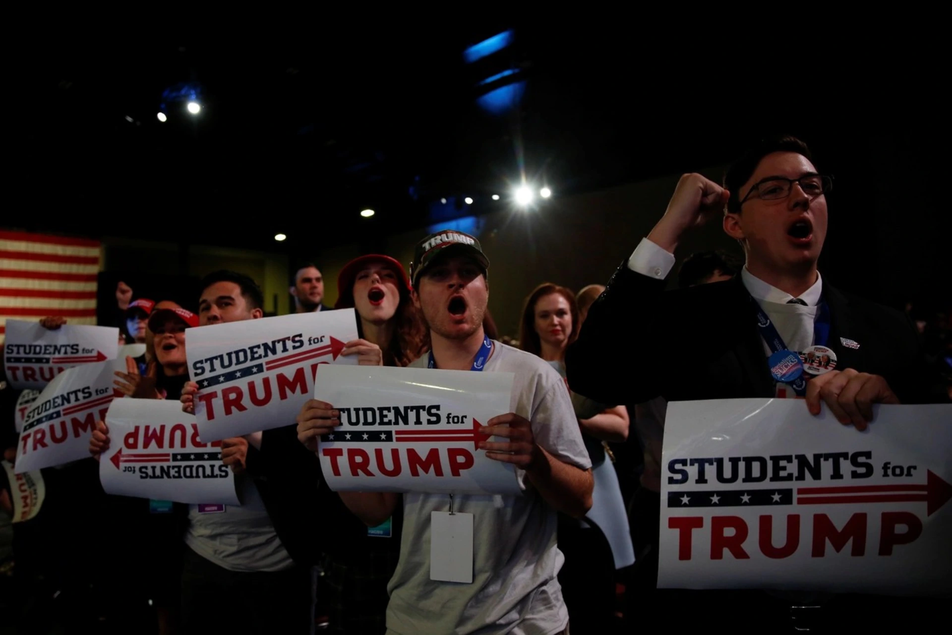 Supporters cheer as U.S. President Donald Trump delivers remarks at the Turning Point USA Student Action Summit. 