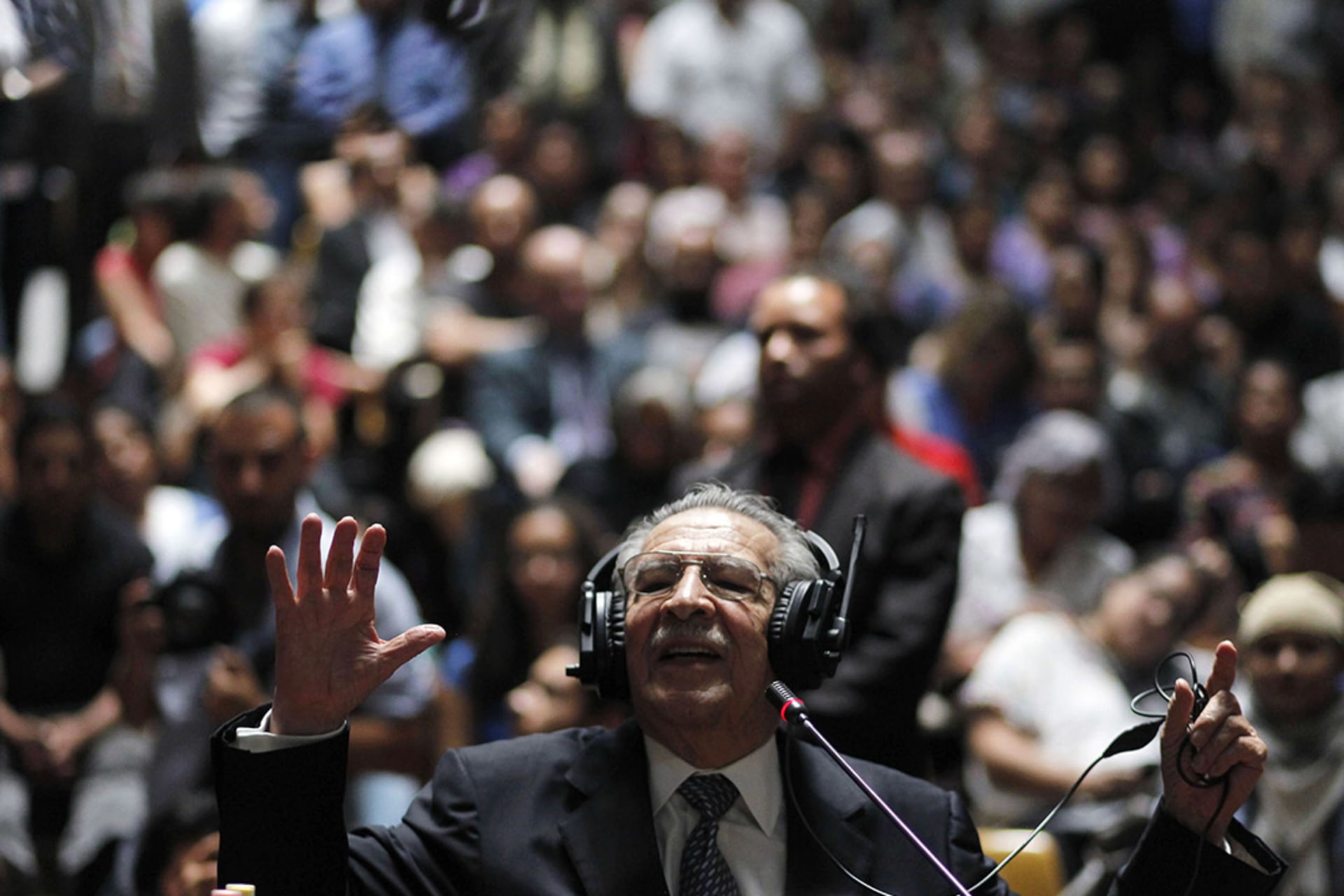 Former Guatemalan President Efrain Rios Montt speaks during his trial at the Supreme Court of Justice in Guatemala City.