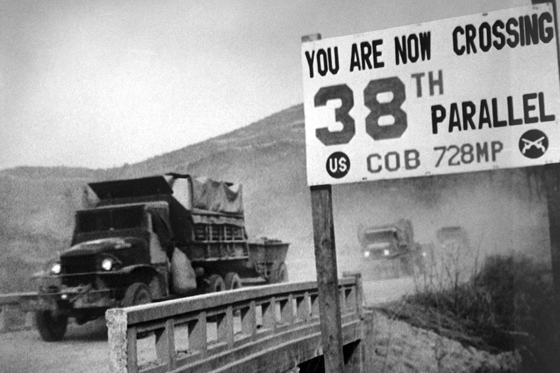 UN trucks cross the 38th parallel as they withdraw from Pyongyang, North Korea, following the Chinese Communist forces reoccupation of the city, in 1950. Interim Archives/Getty Images