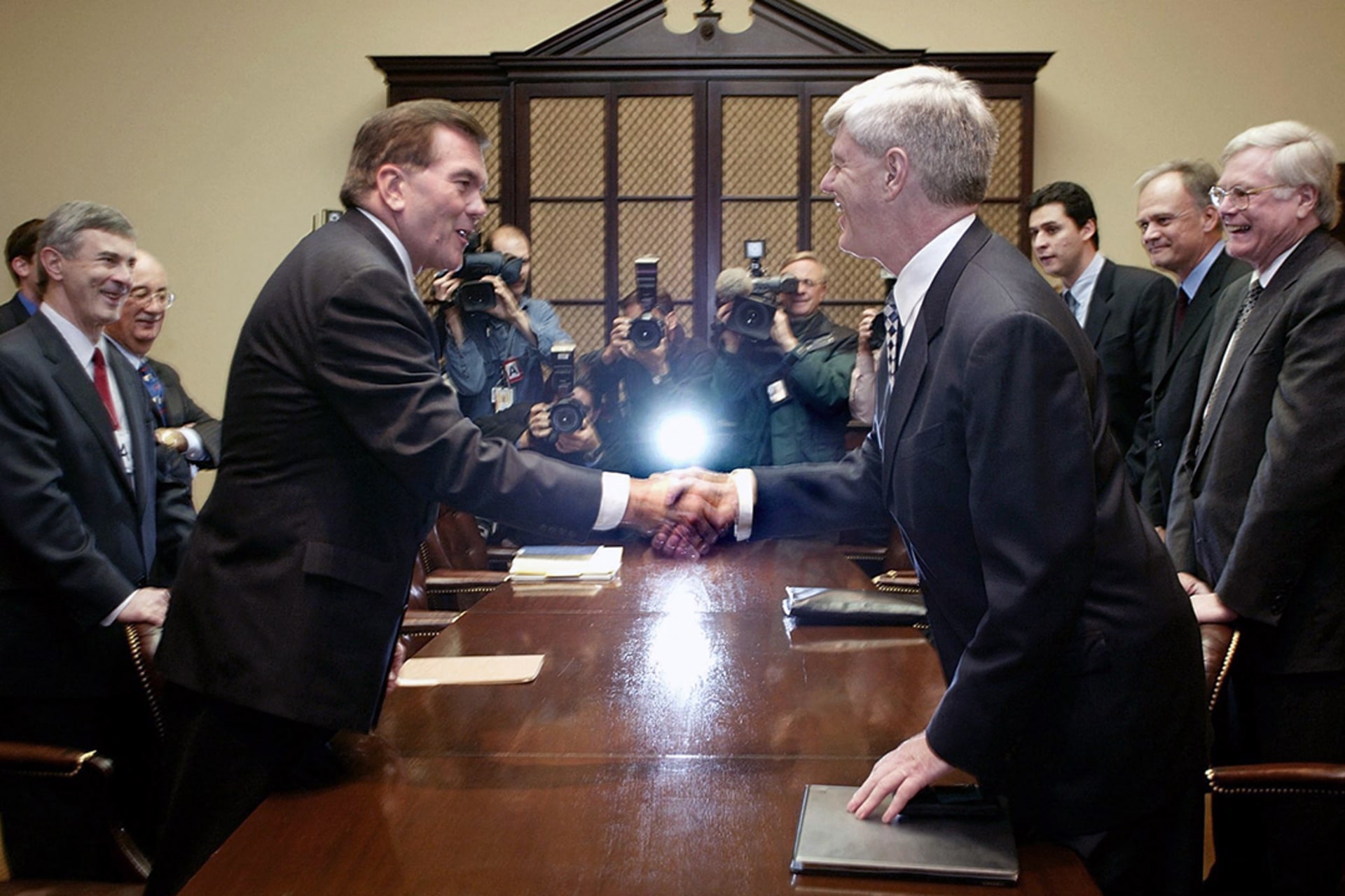 U.S. Homeland Security Advisor Tom Ridge shakes hands with Canadian Deputy Prime Minister John Manley during a meeting on the U.S.-Canada Smart Border Action Plan at the White House. Stephen Jaffe/AFP/Getty Images